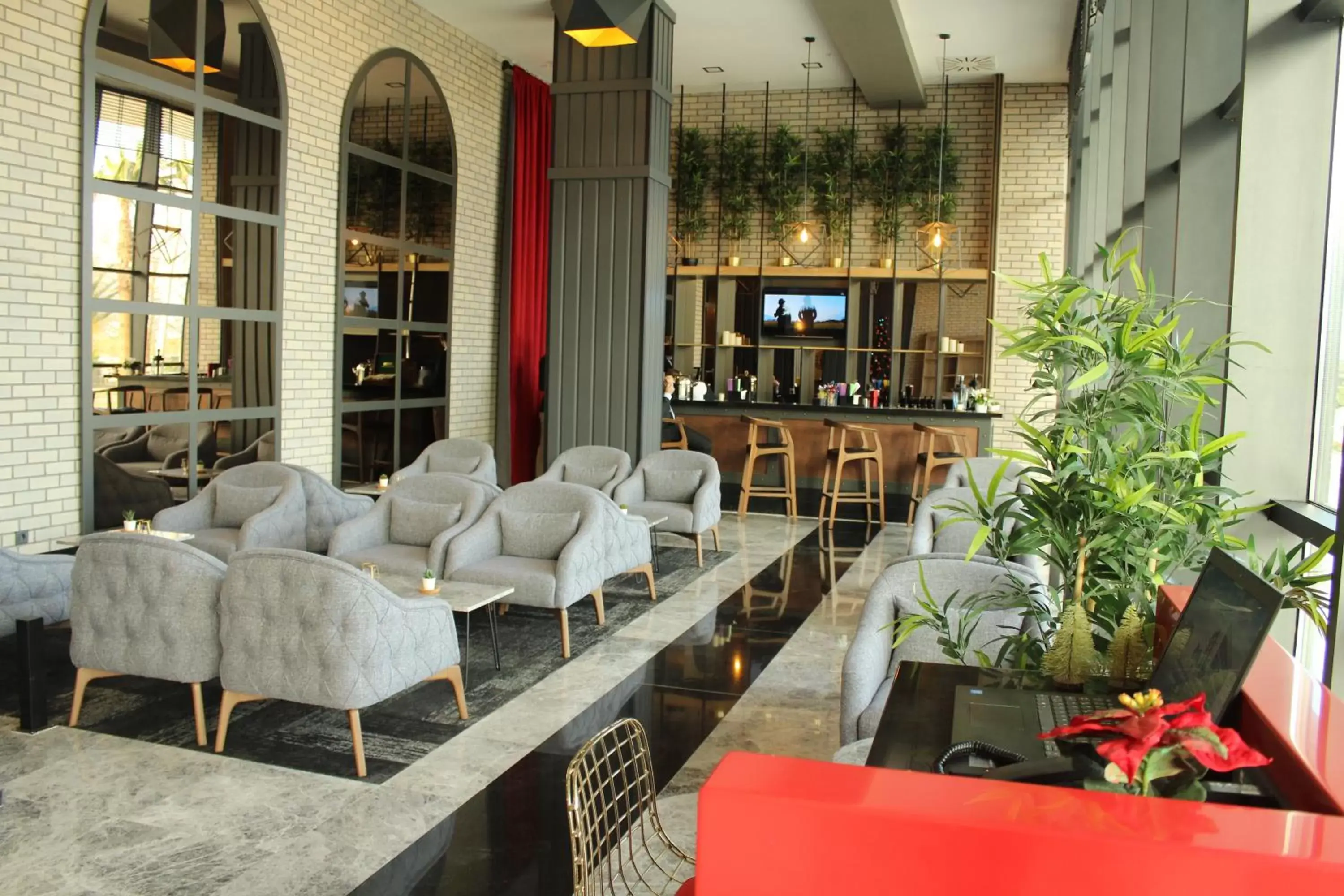 Lounge or bar in Ramada By Wyndham Tire Lounge or bar in Ramada By Wyndham Tire