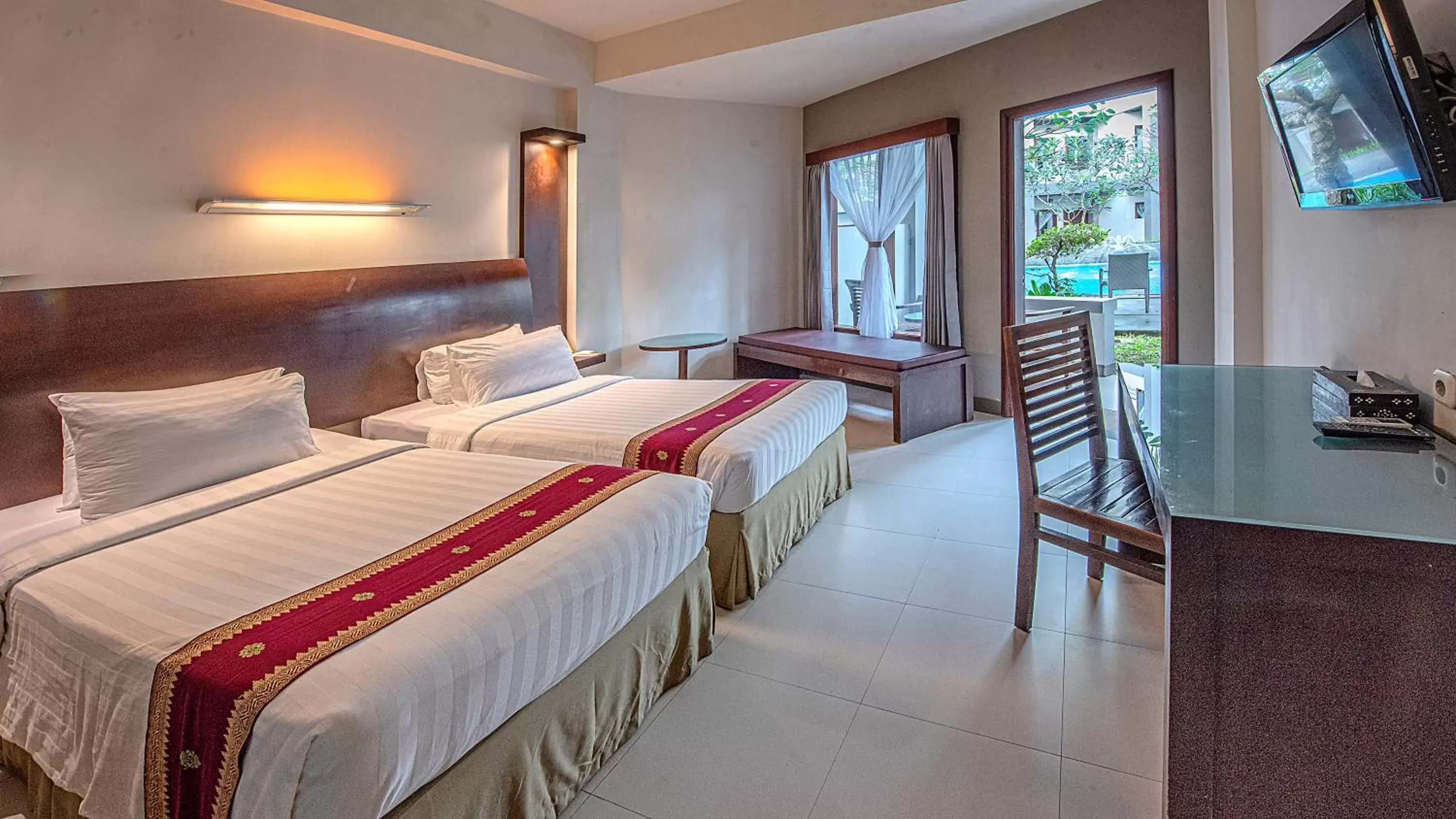 Bed in Lombok Garden Hotel