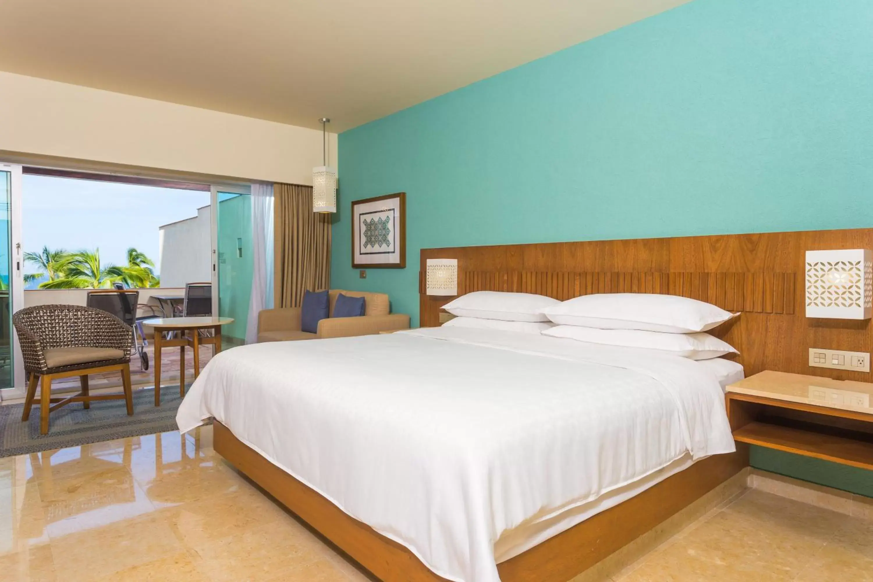 Photo of the whole room, Bed in Sheraton Buganvilias Resort & Convention Center