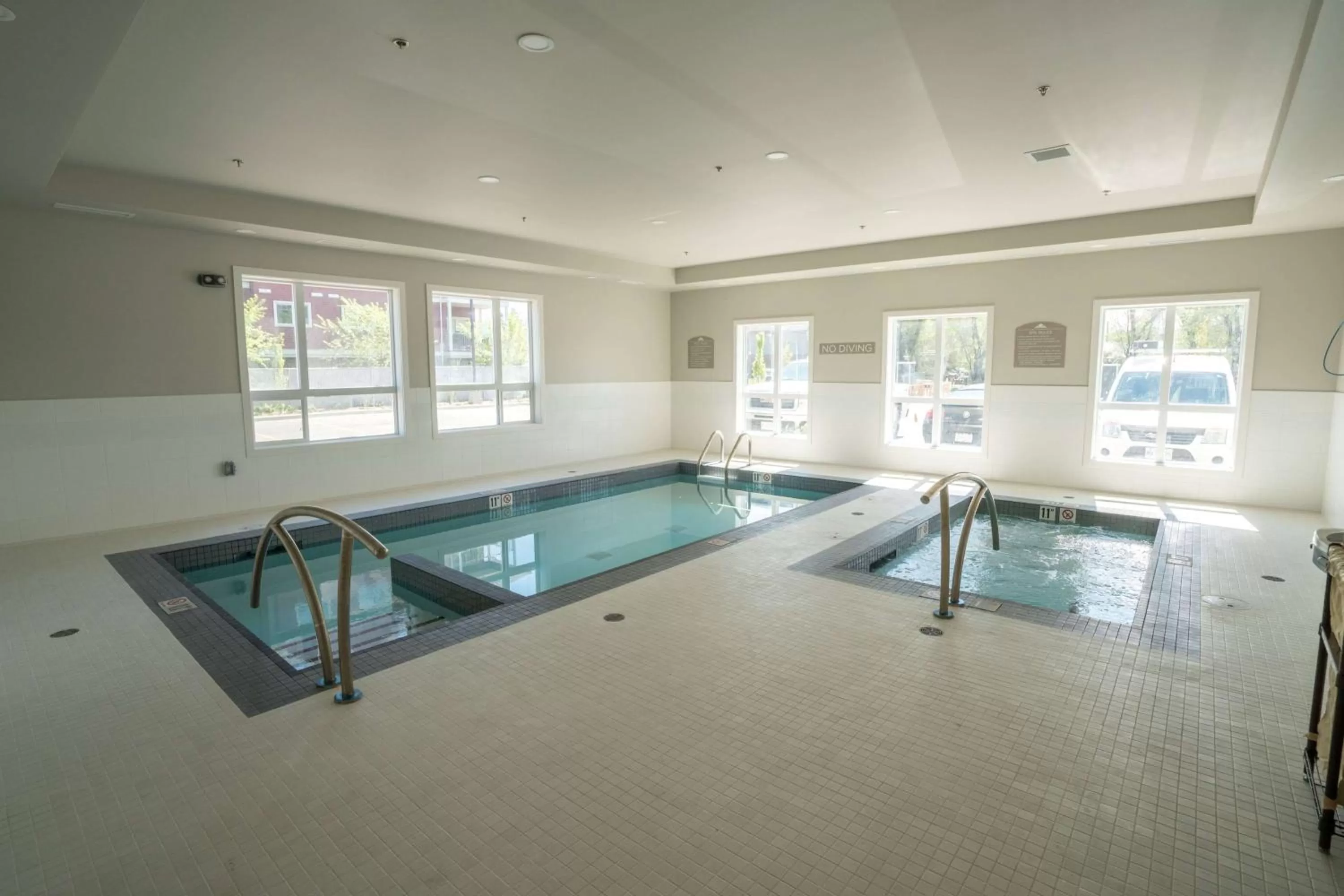 Queen Room with Two Queen Beds - Non-Smoking in Microtel Inn & Suites by Wyndham Kelowna