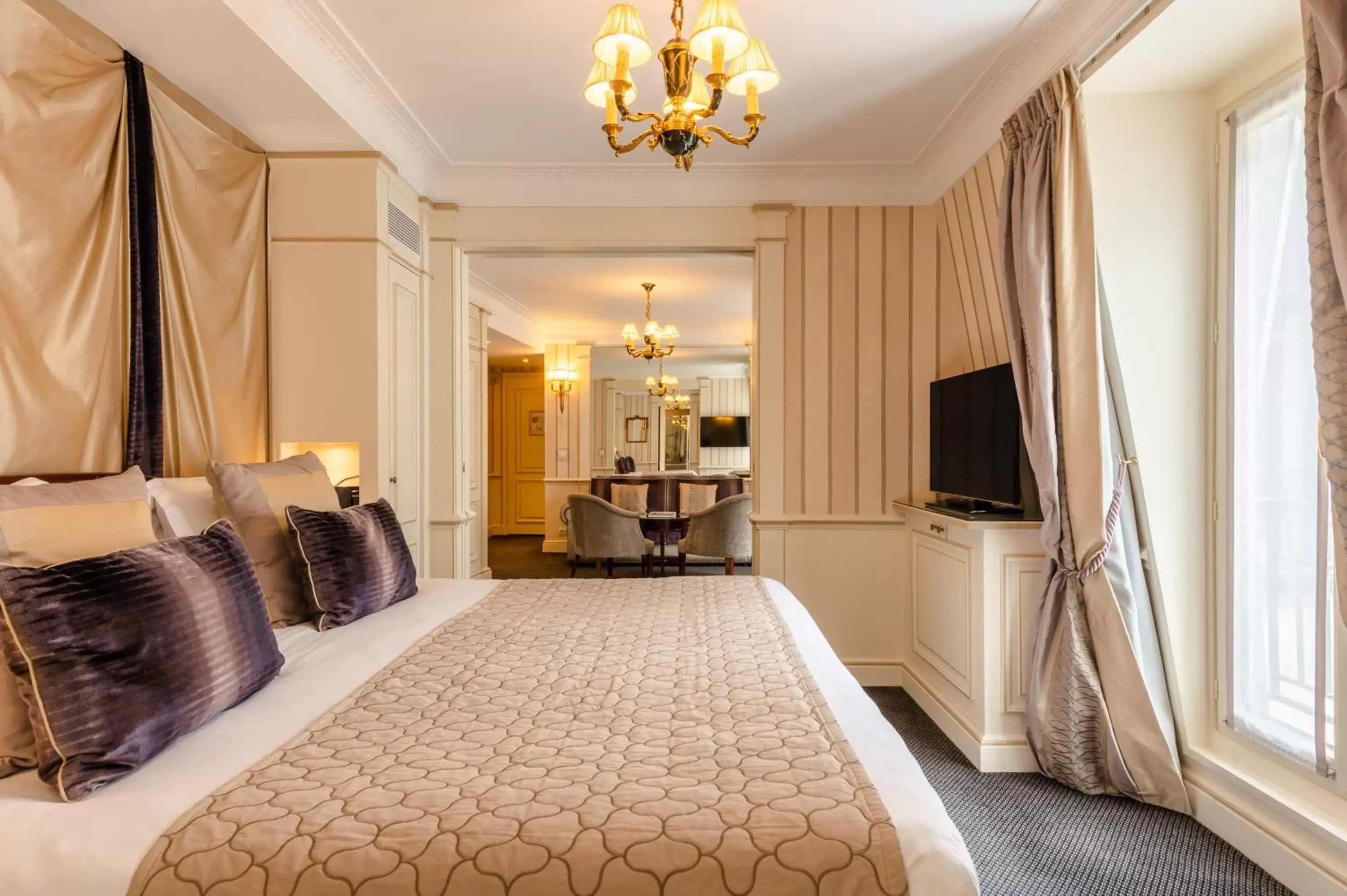 Bedroom, Seating Area in Hotel Napoleon Paris