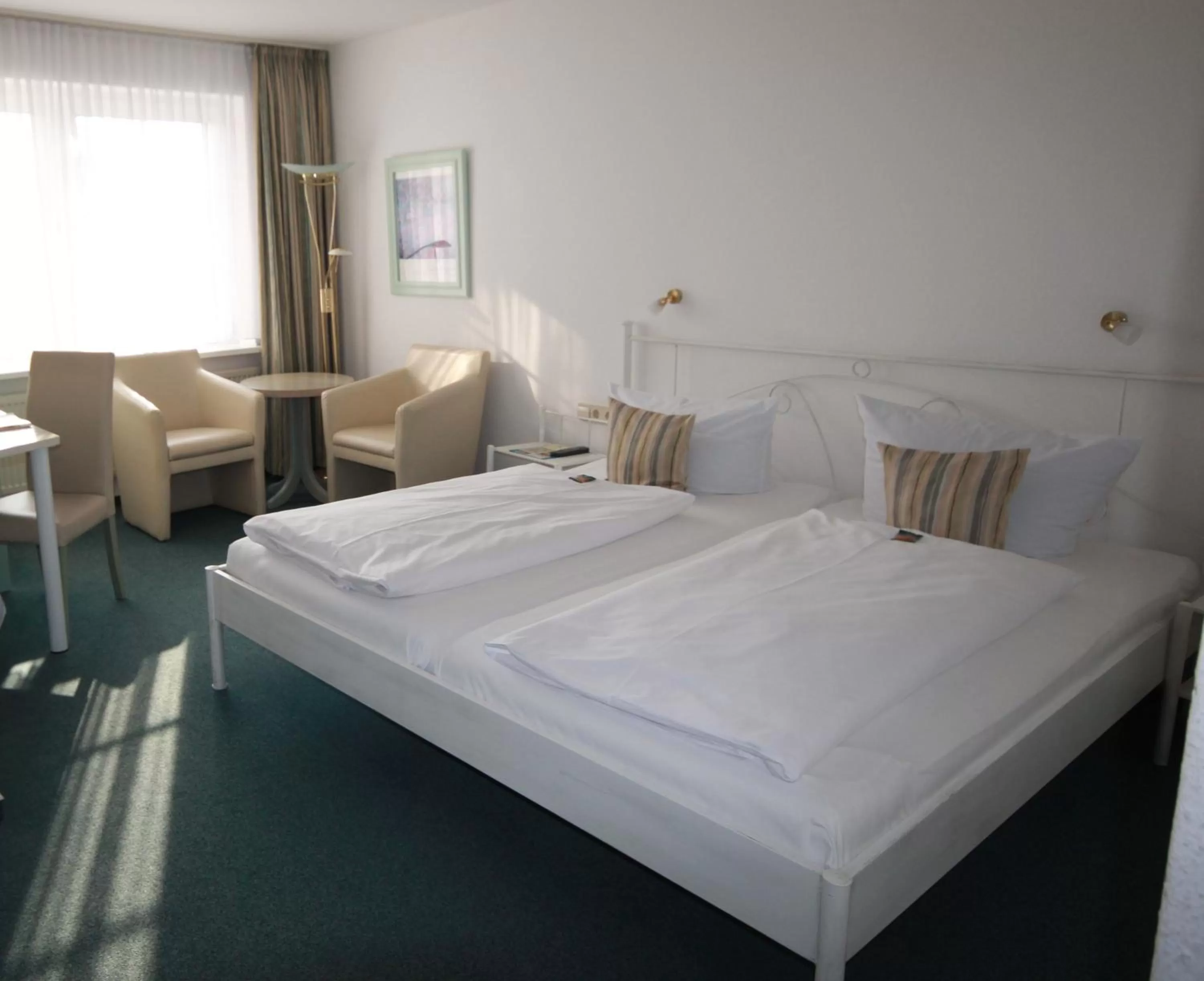 Photo of the whole room, Bed in Brackstedter Mühle e.K.