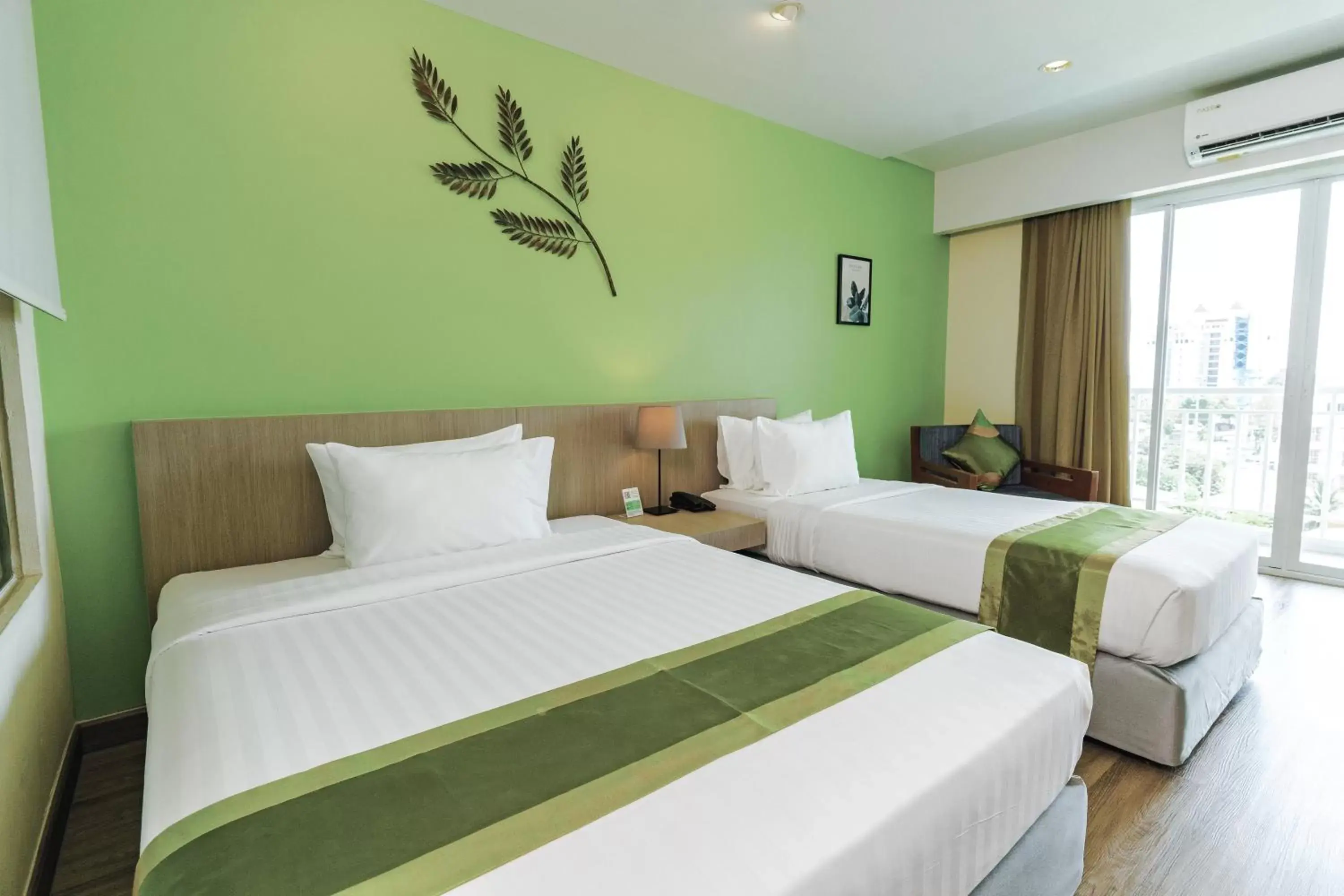 Bed in Tamarind Garden Hotel - SHA Plus Certified