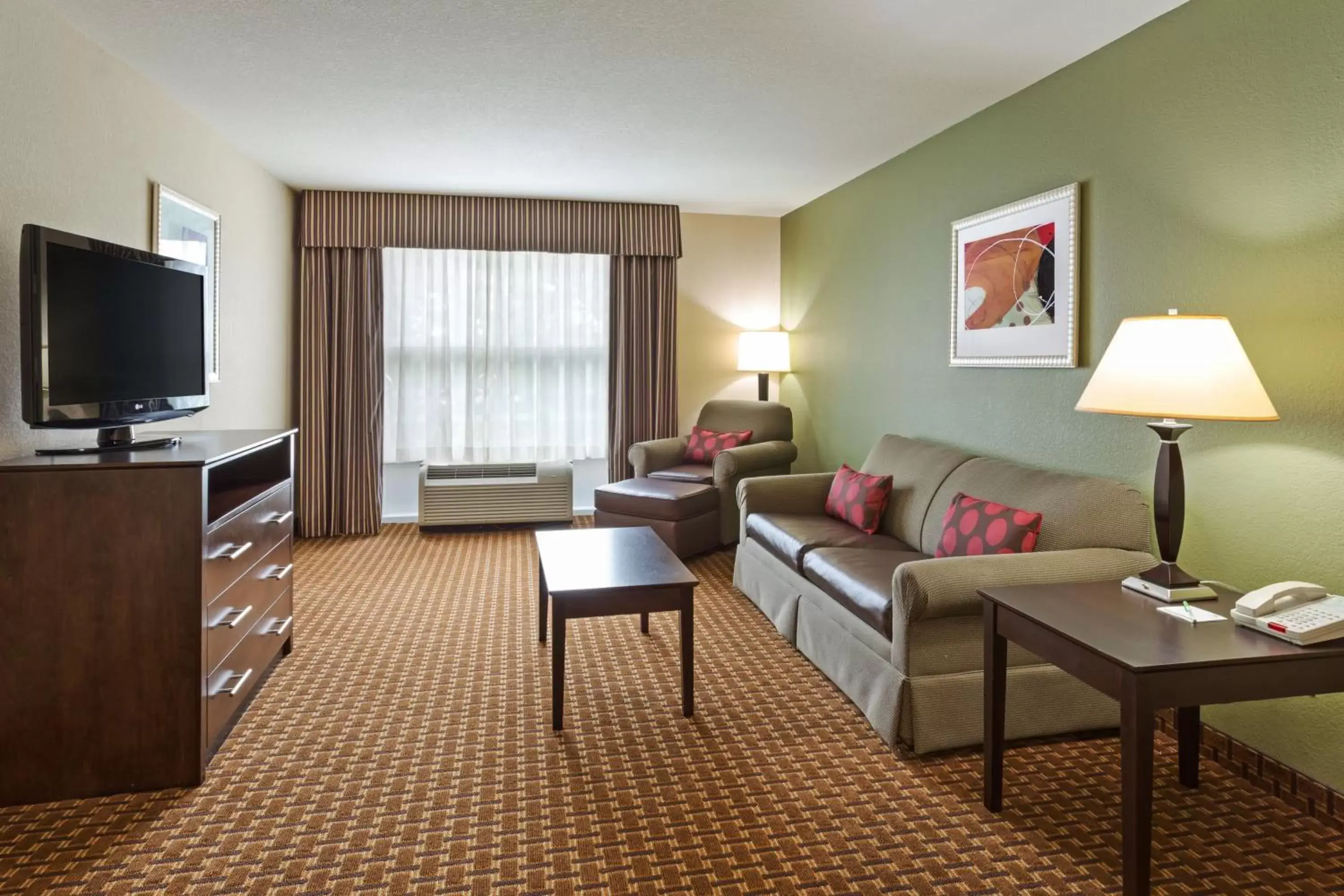 Photo of the whole room, Seating Area in Holiday Inn Daytona Beach LPGA Boulevard, an IHG Hotel