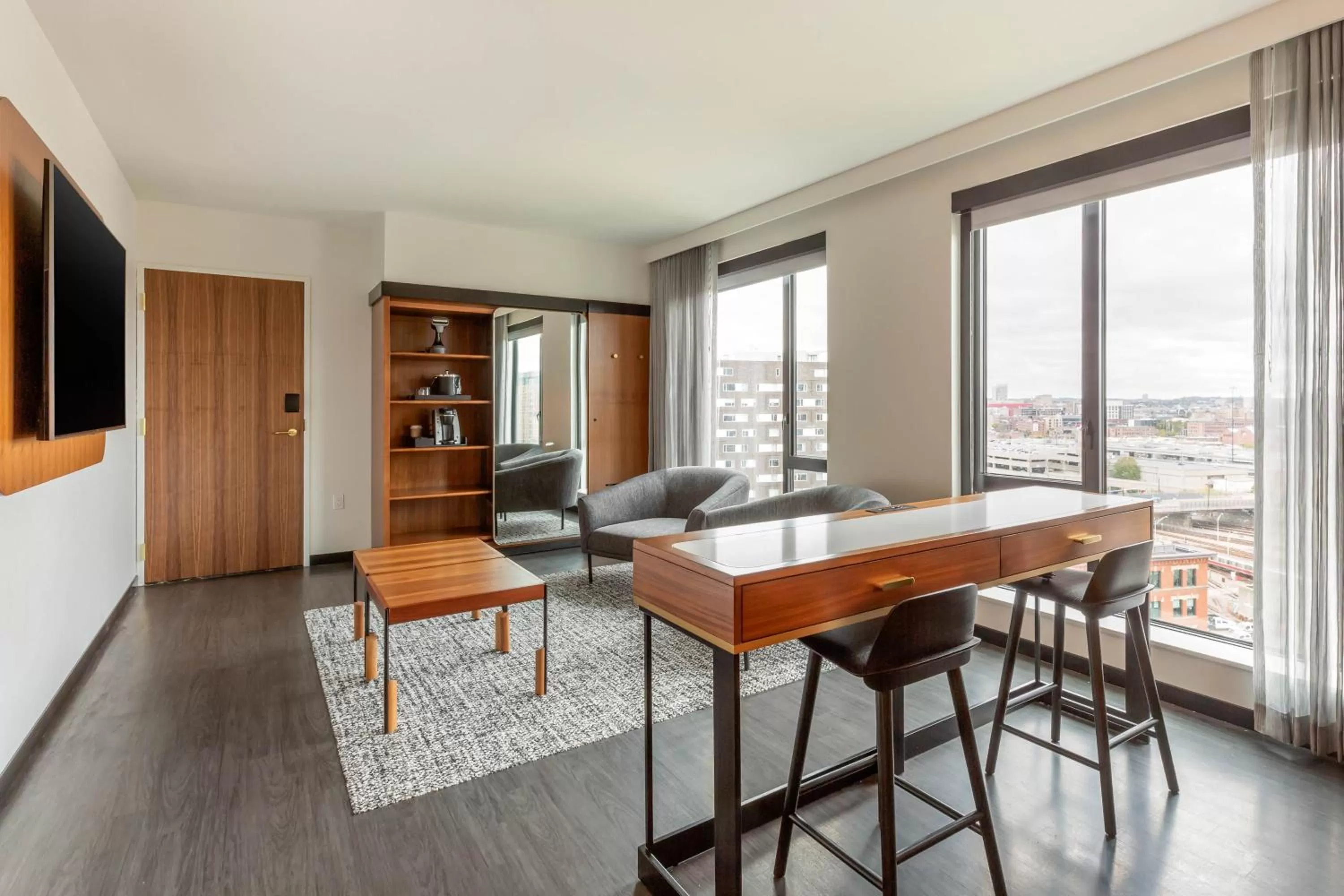 Living room in Cambria Hotel Boston Downtown - Seaport