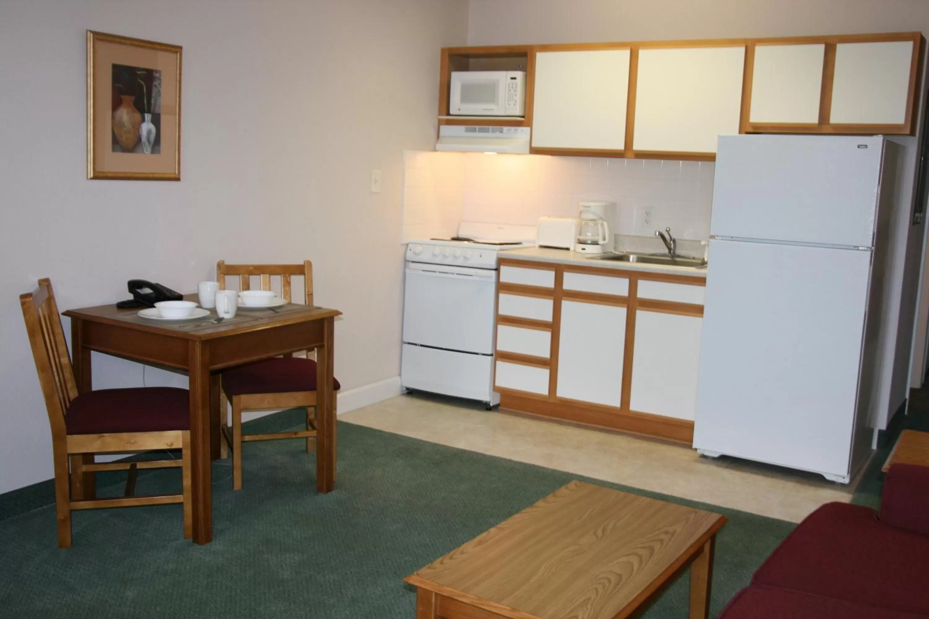 Kitchen or kitchenette in Affordable Suites Rocky Mount
