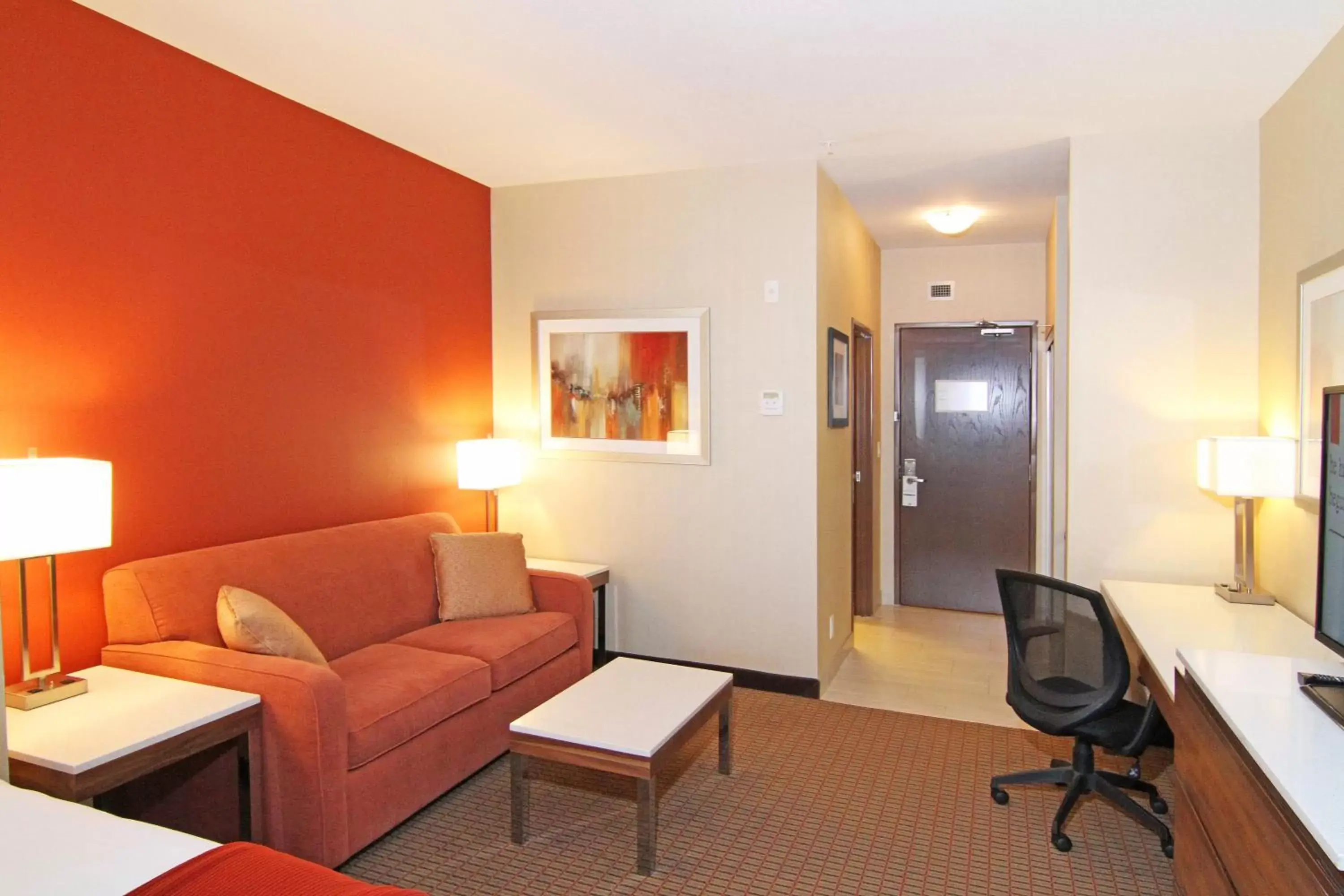 Photo of the whole room, Seating Area in Holiday Inn Express and Suites Calgary University, an IHG Hotel