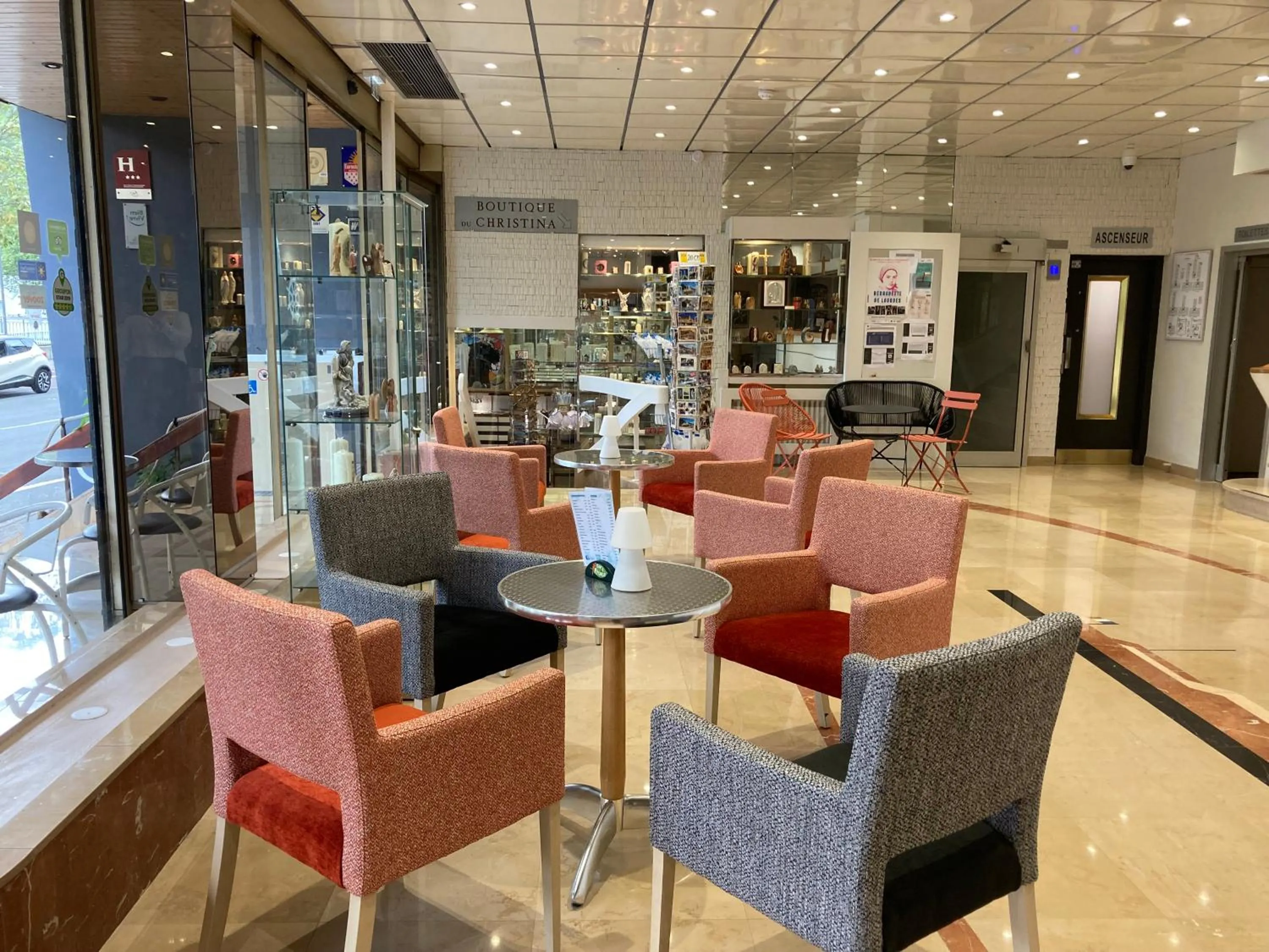 Lobby or reception in Hôtel Christina Lourdes