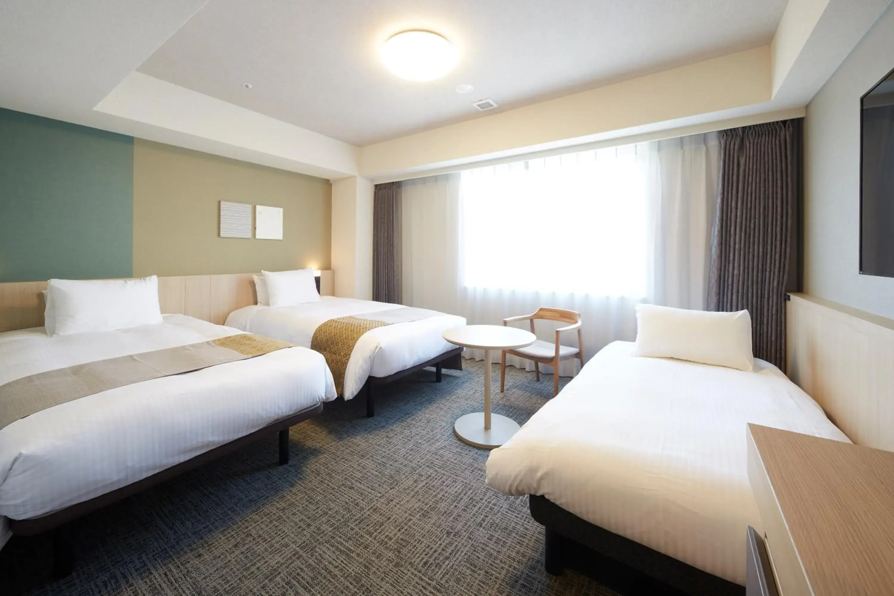 Photo of the whole room, Bed in Iroha Grand Hotel Matsumoto Ekimae