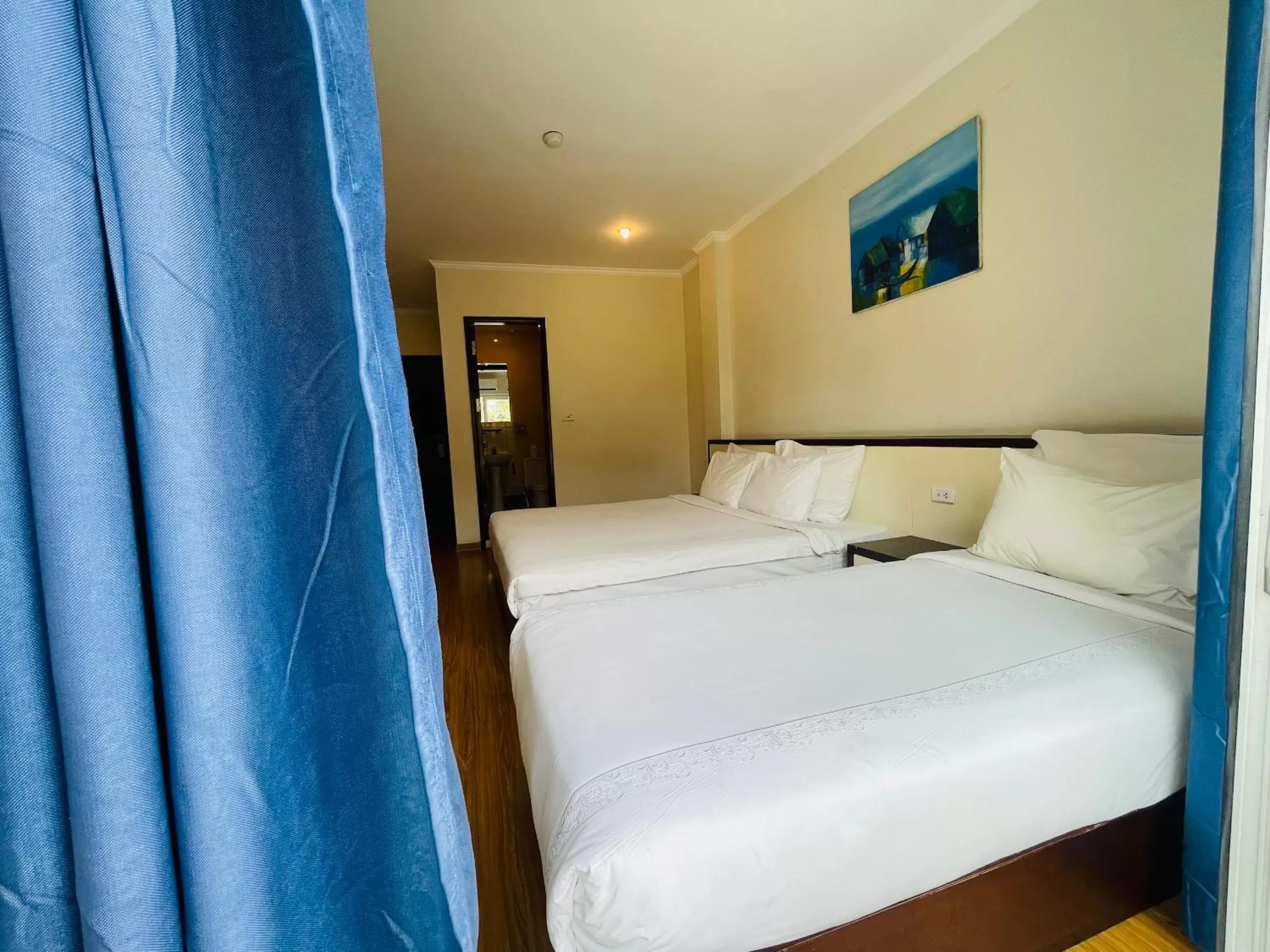 Property building, Bed in Rising Dragon Hotel