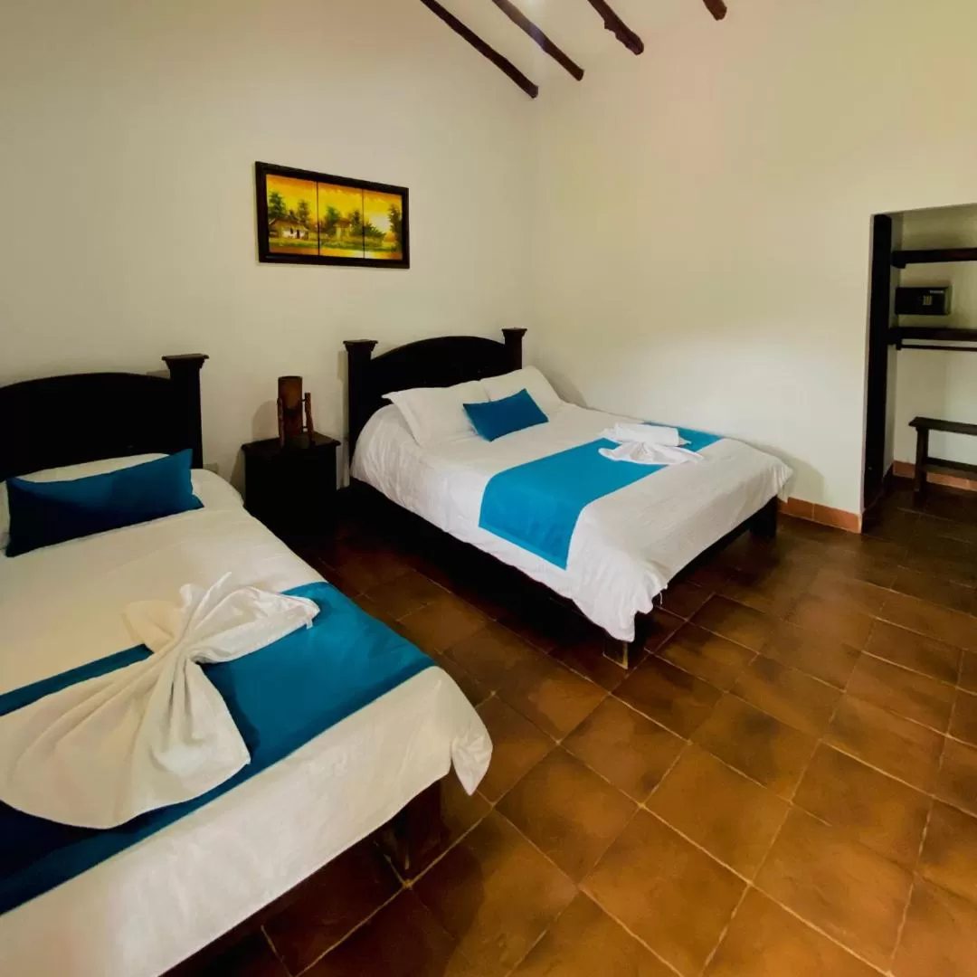 Bed in Hotel Hacienda Santa Barbara