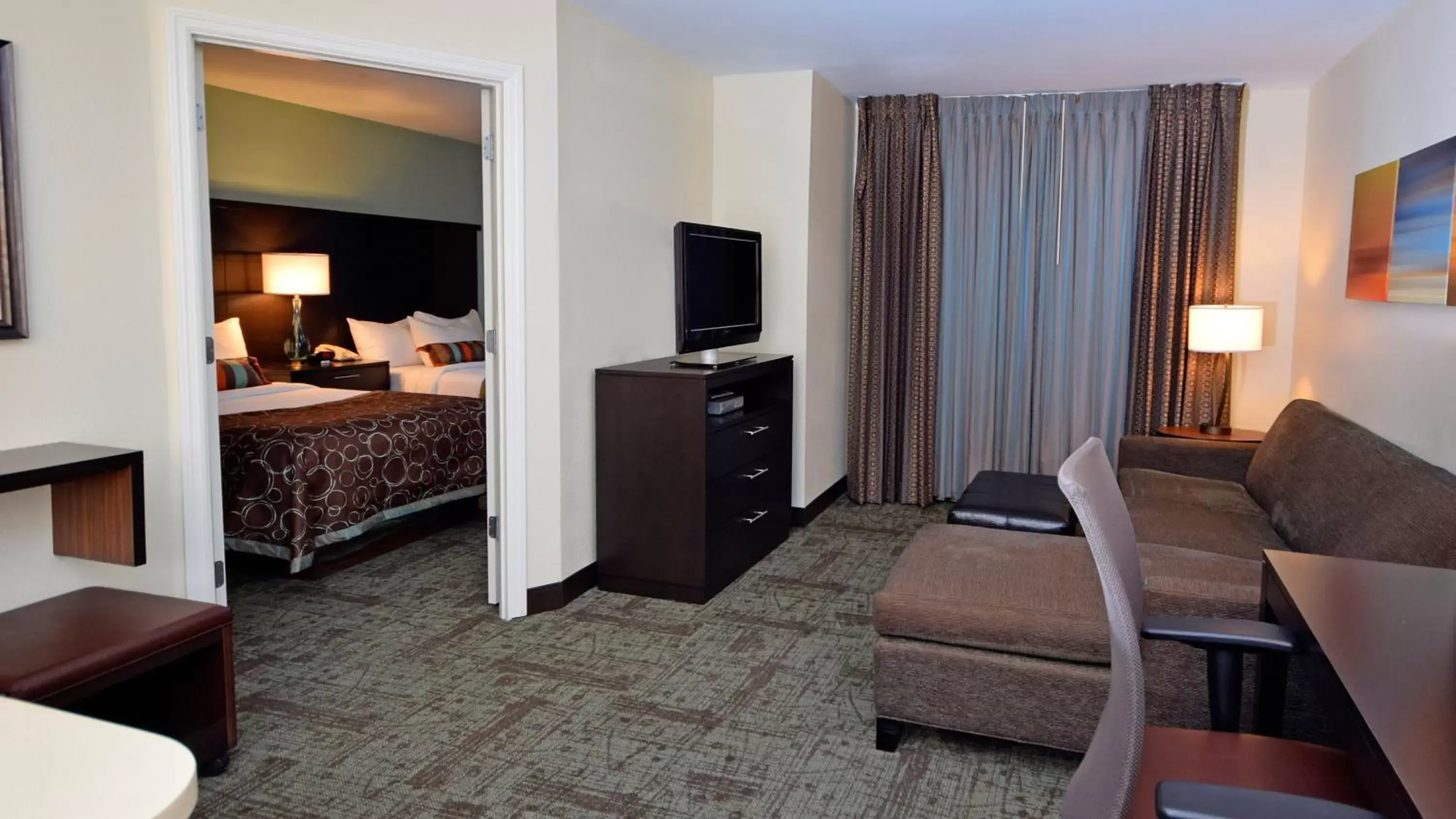 Photo of the whole room, TV/Entertainment Center in Staybridge Suites - Cincinnati North, an IHG Hotel