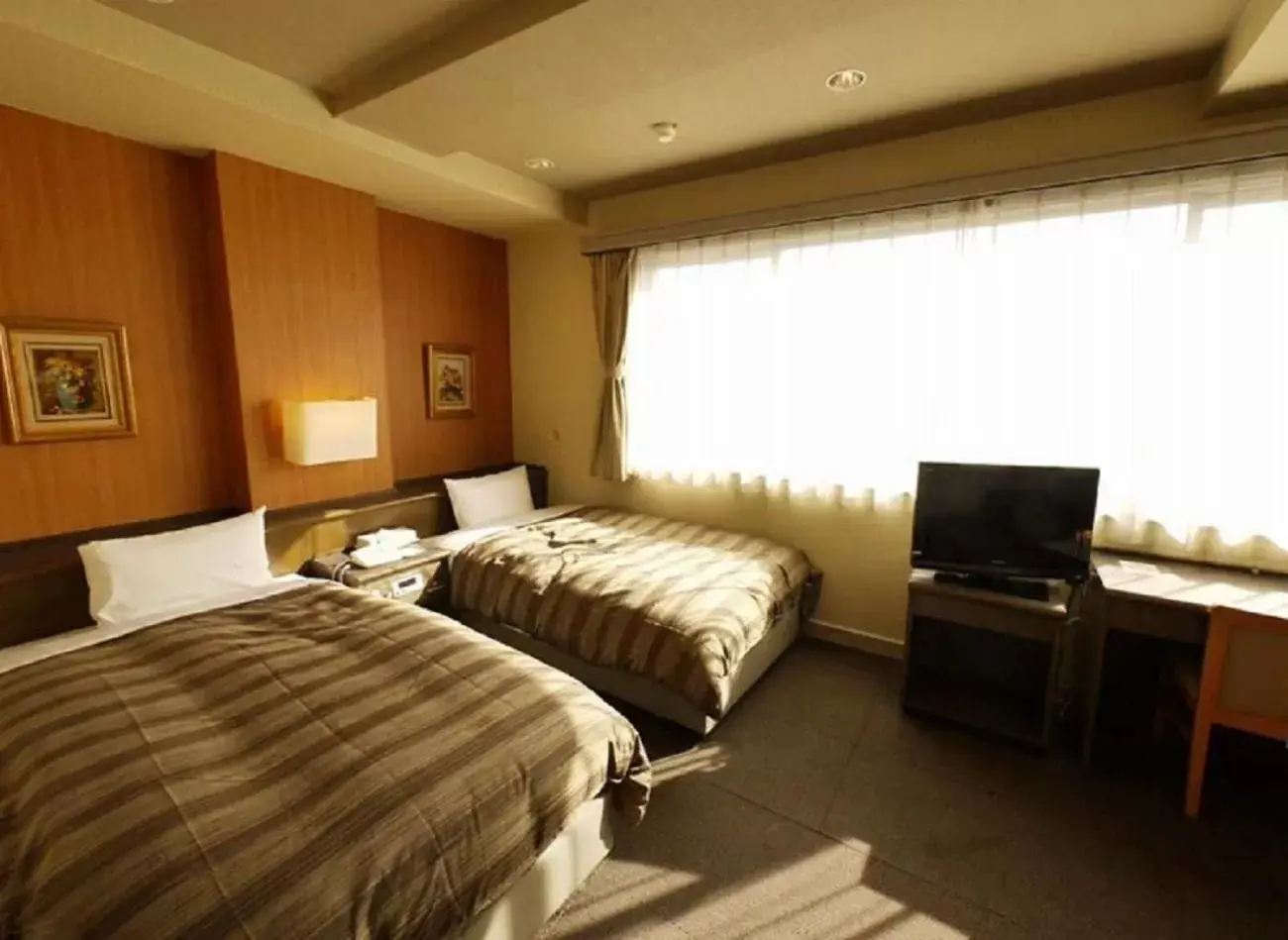 Bed in Hotel Route-Inn Court Chikuma-Koshoku