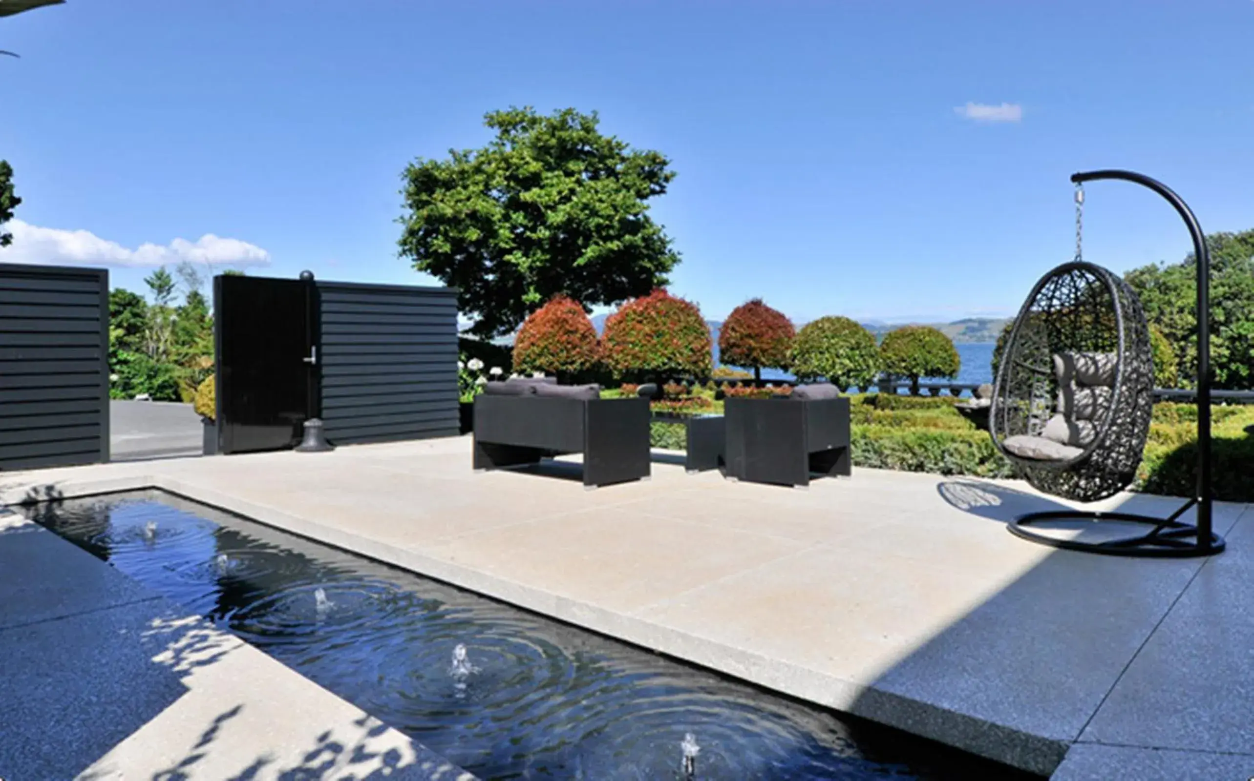 Patio, Swimming Pool in Black Swan Lakeside Lodge Boutique Hotel