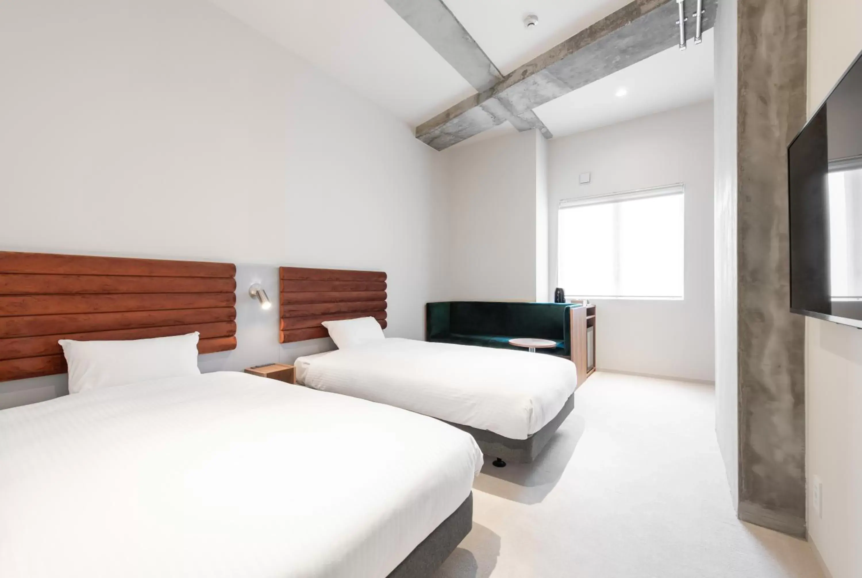 Bed in KIRO Hiroshima by THE SHARE HOTELS