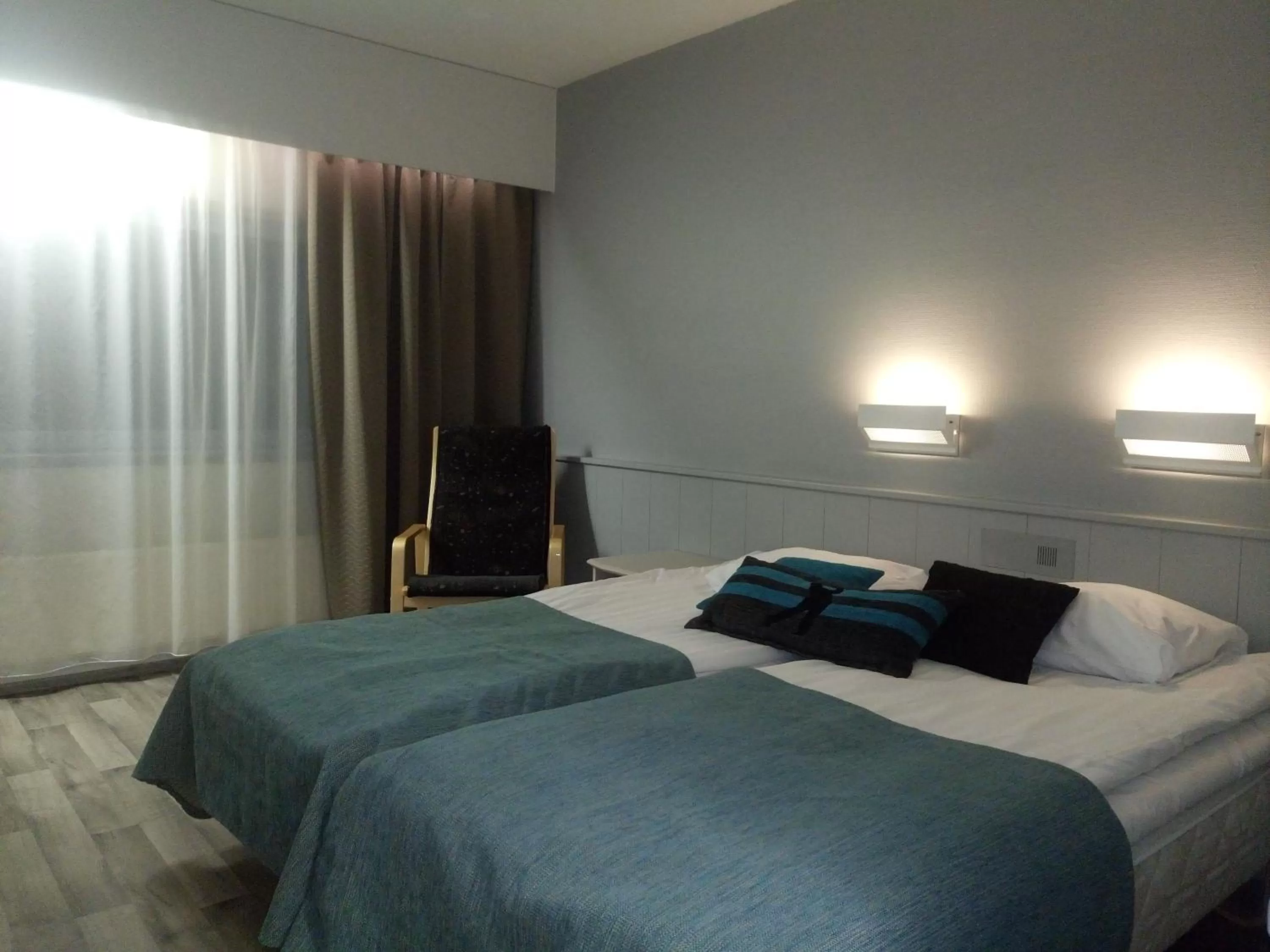 Bed in Hotelli Kivitippu