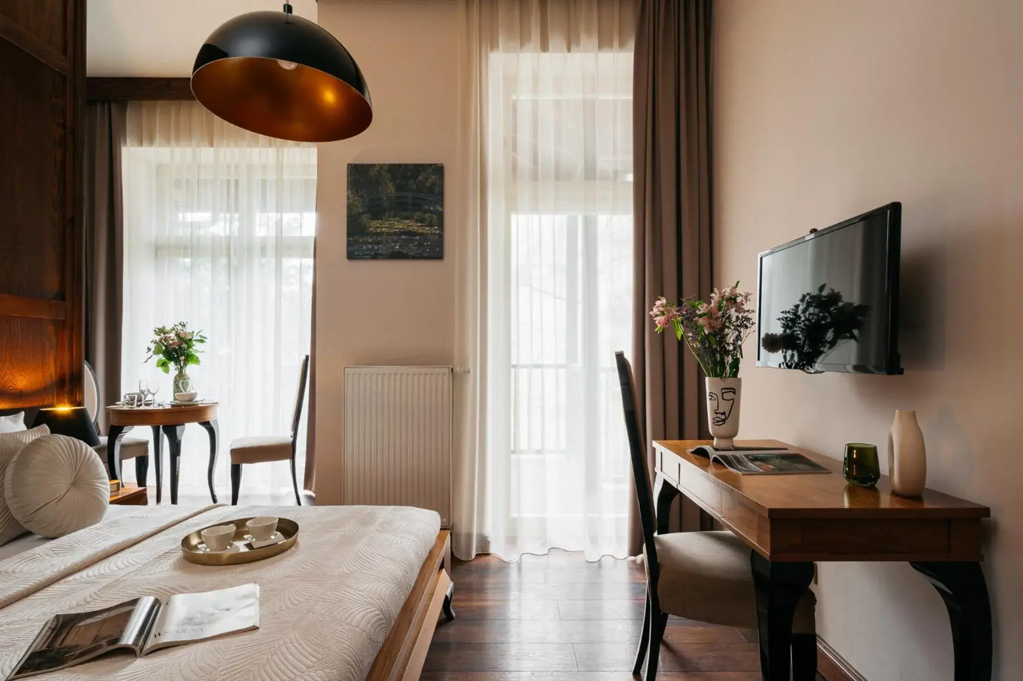 Bed, Dining Area in Topolowa Residence