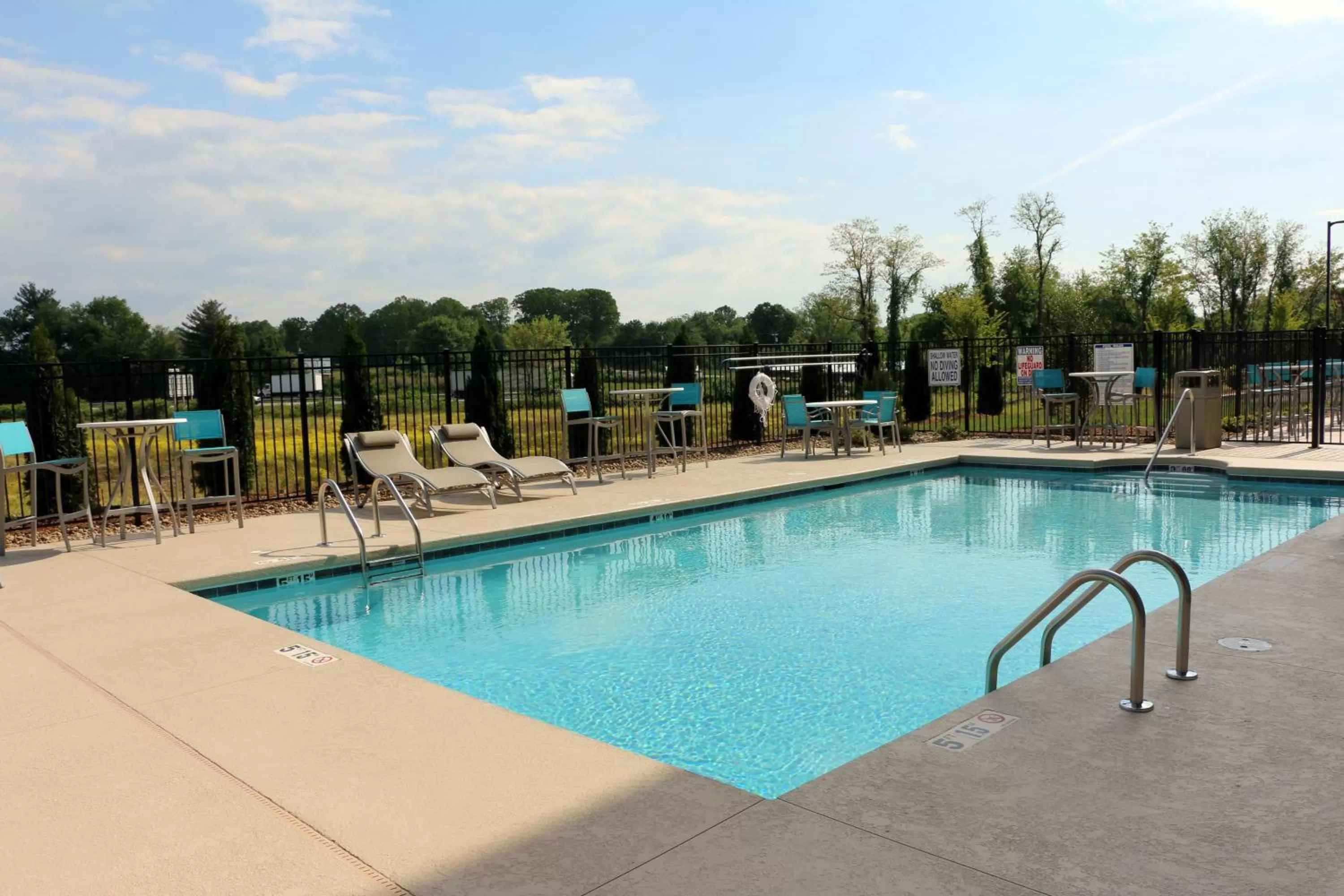 Swimming pool in Holiday Inn Express & Suites - Hendersonville SE - Flat Rock by IHG