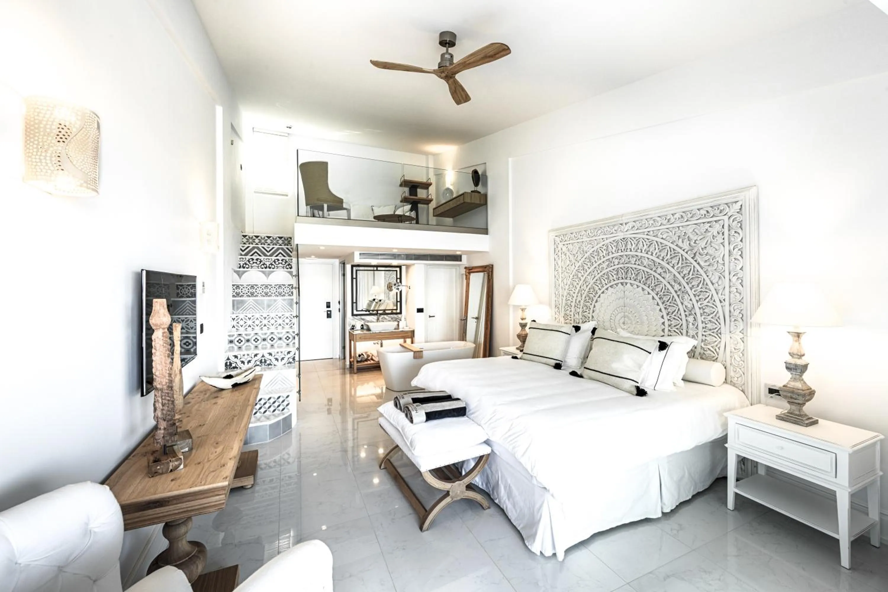 Bed in Abaton Island Resort & Spa