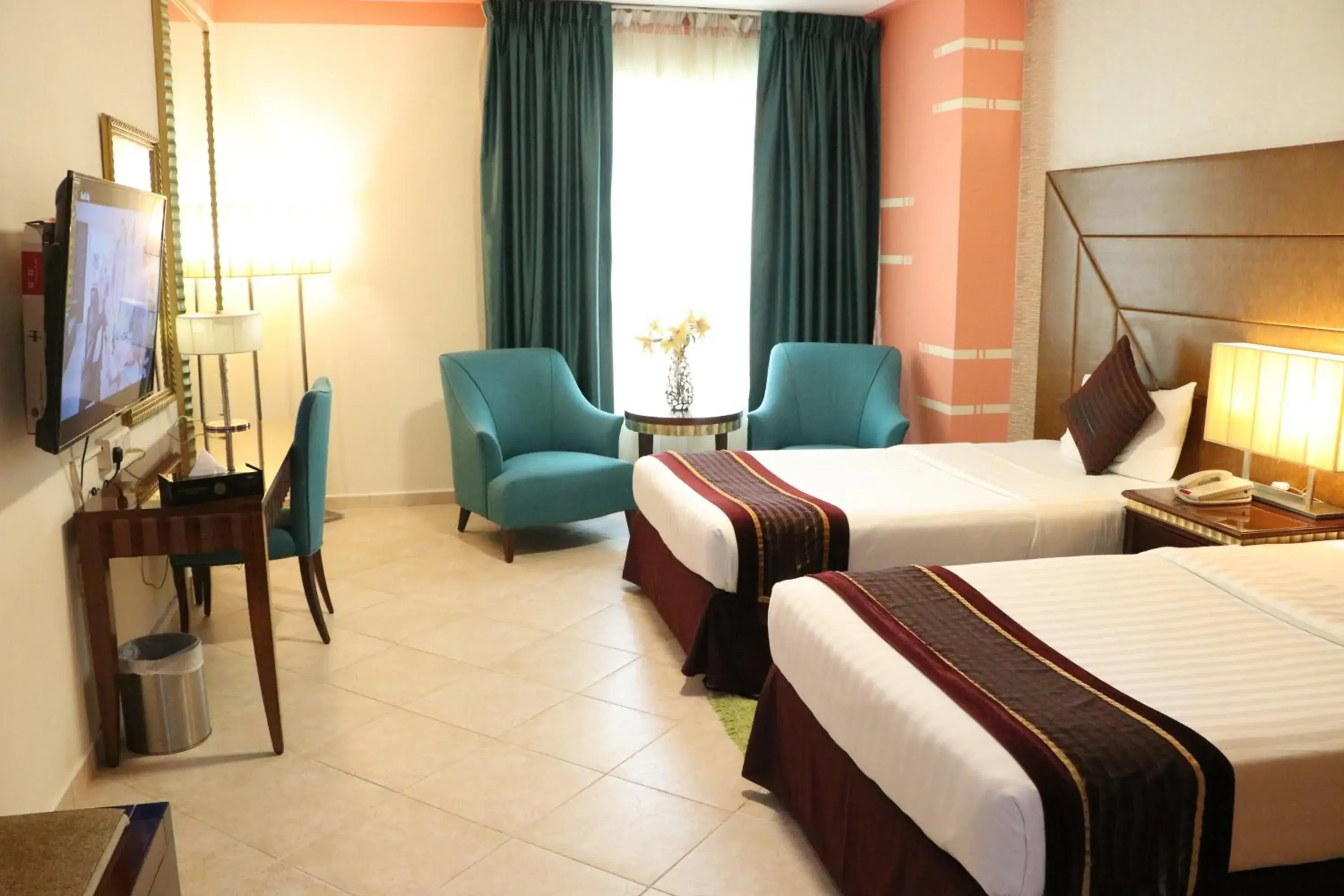 Bed in Al Manar Grand Hotel Apartment