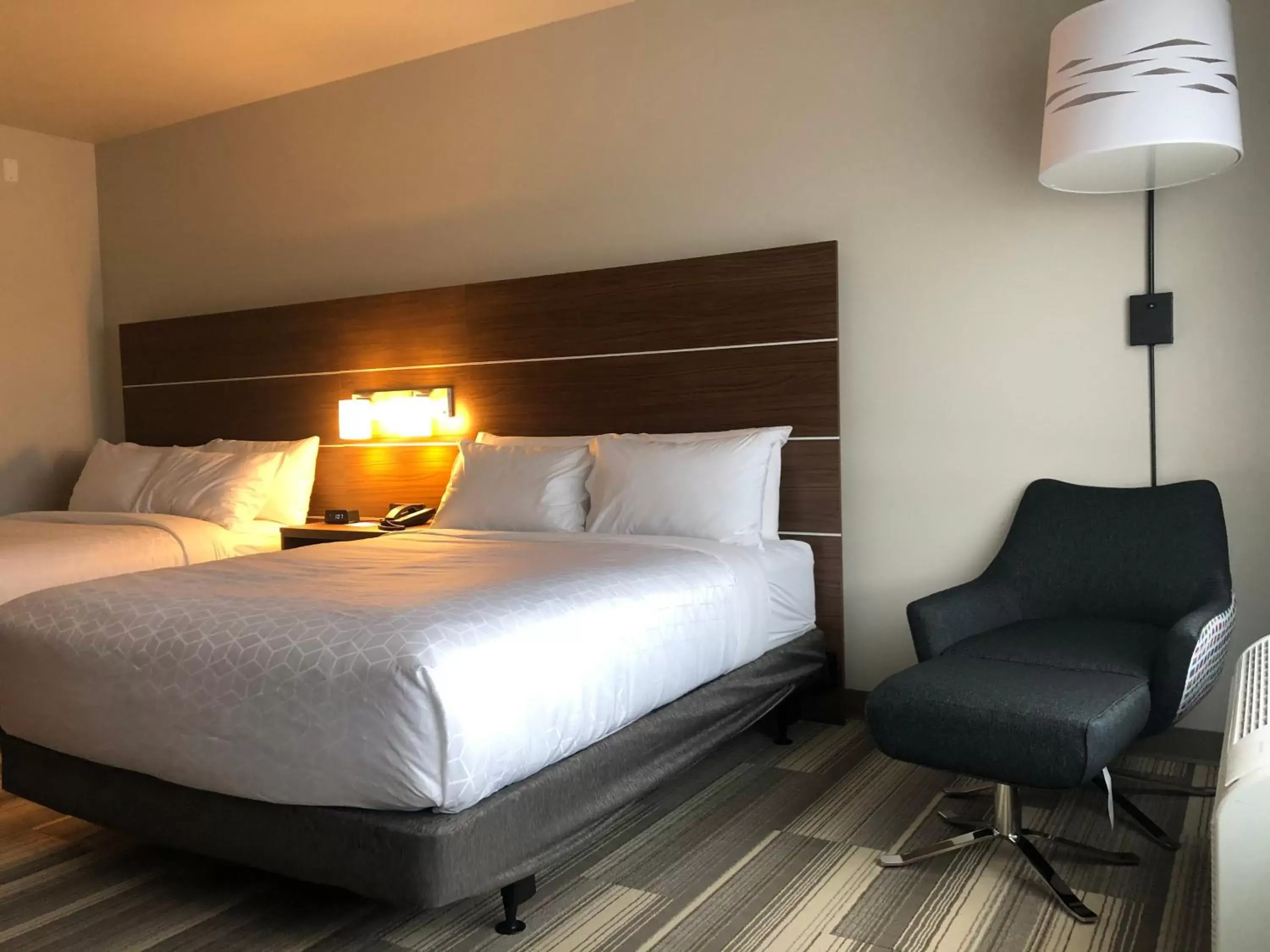 Bed in Holiday Inn Express & Suites Madison, an IHG Hotel