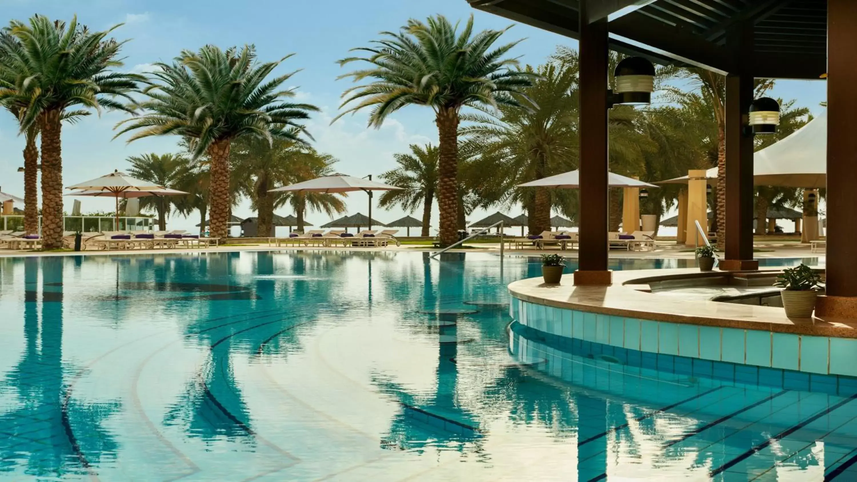 Lounge or bar, Swimming Pool in InterContinental Doha Beach & Spa, an IHG Hotel