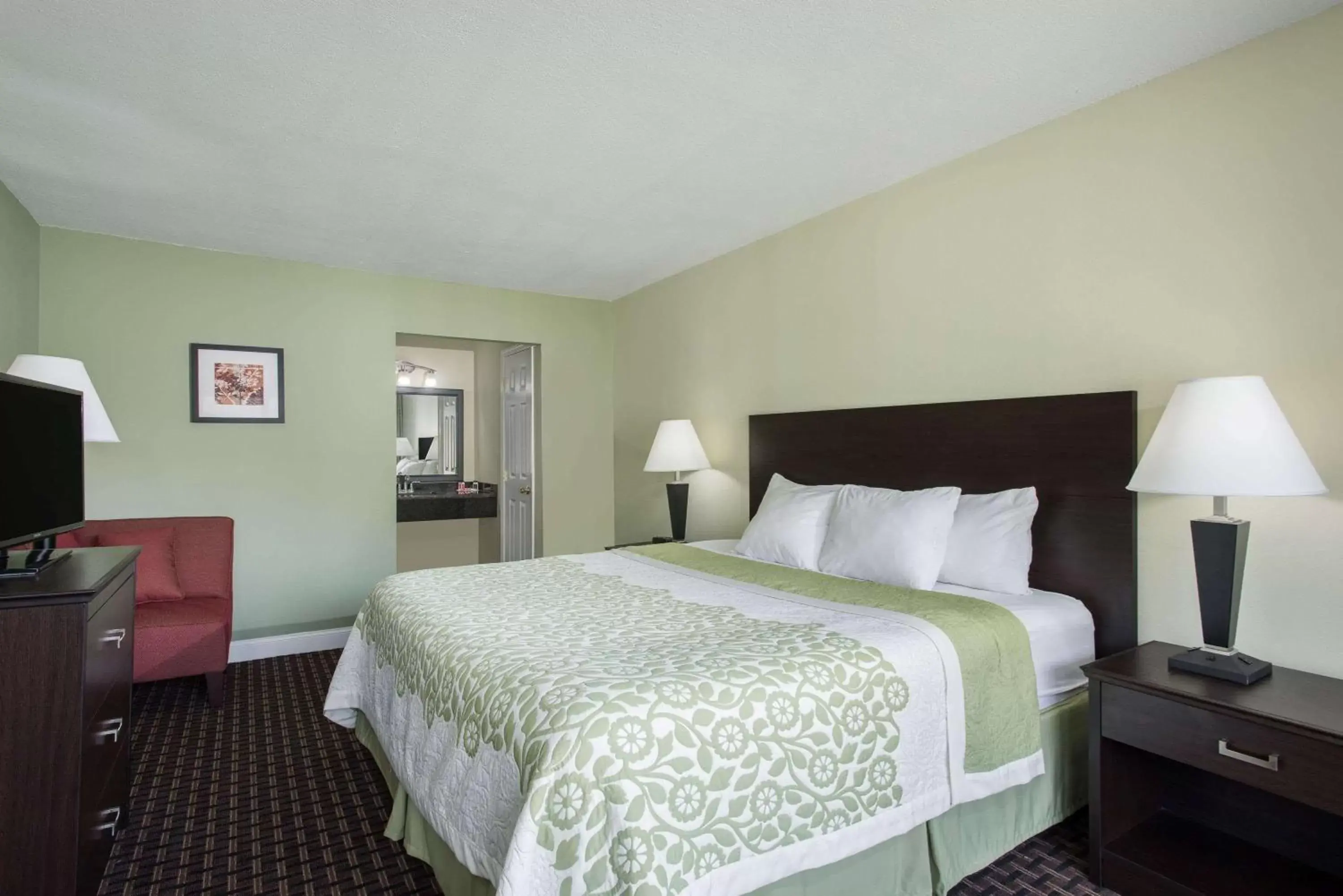 Photo of the whole room, Bed in Days Inn by Wyndham Jellico - Tennessee State Line