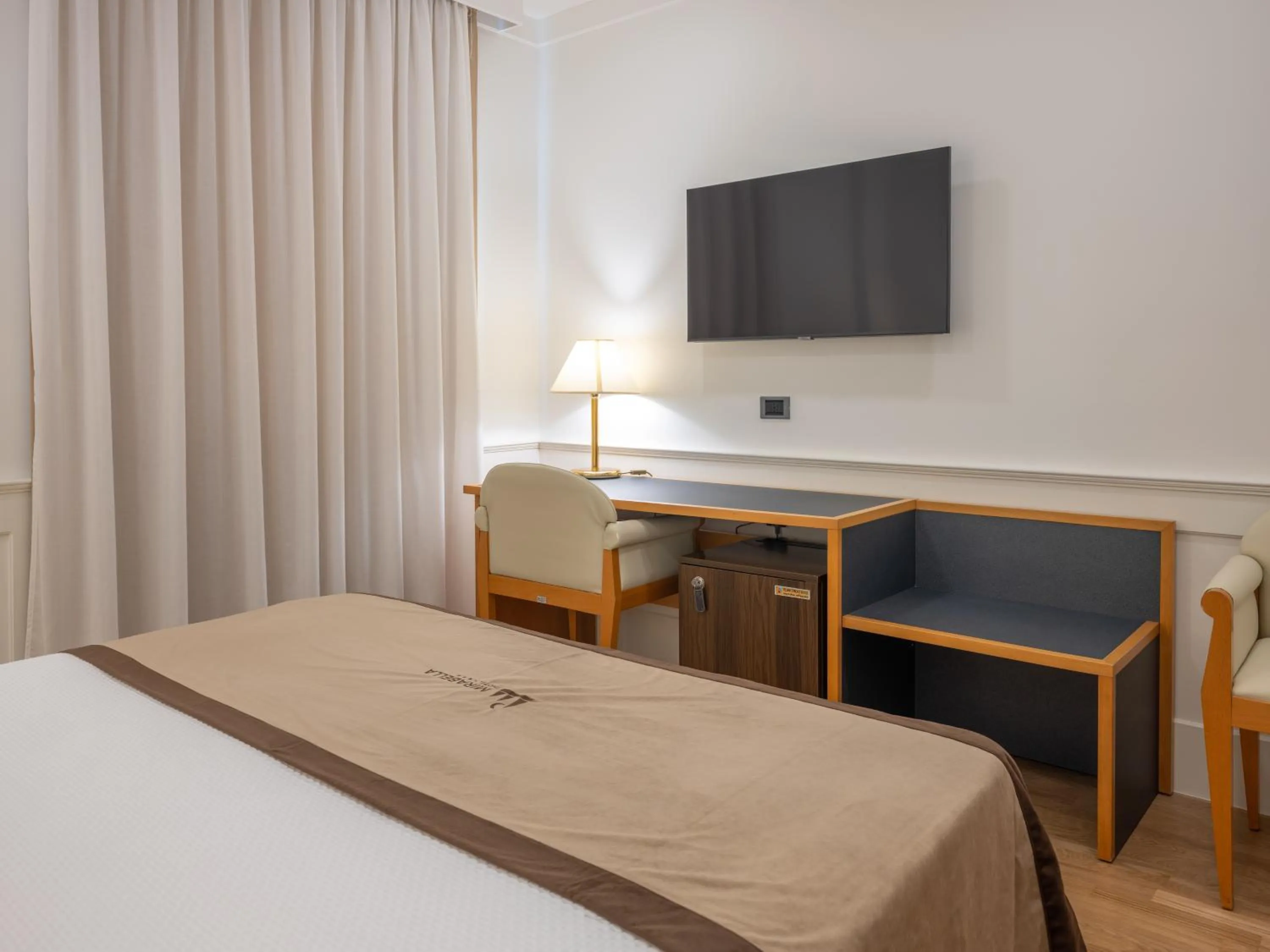 Photo of the whole room, Bed in Mirabella Hotel