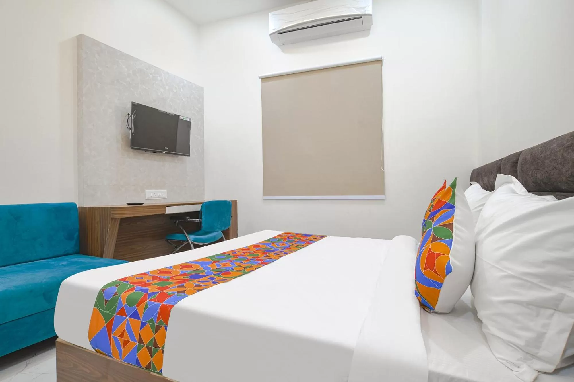 Bed in FabHotel Ramya