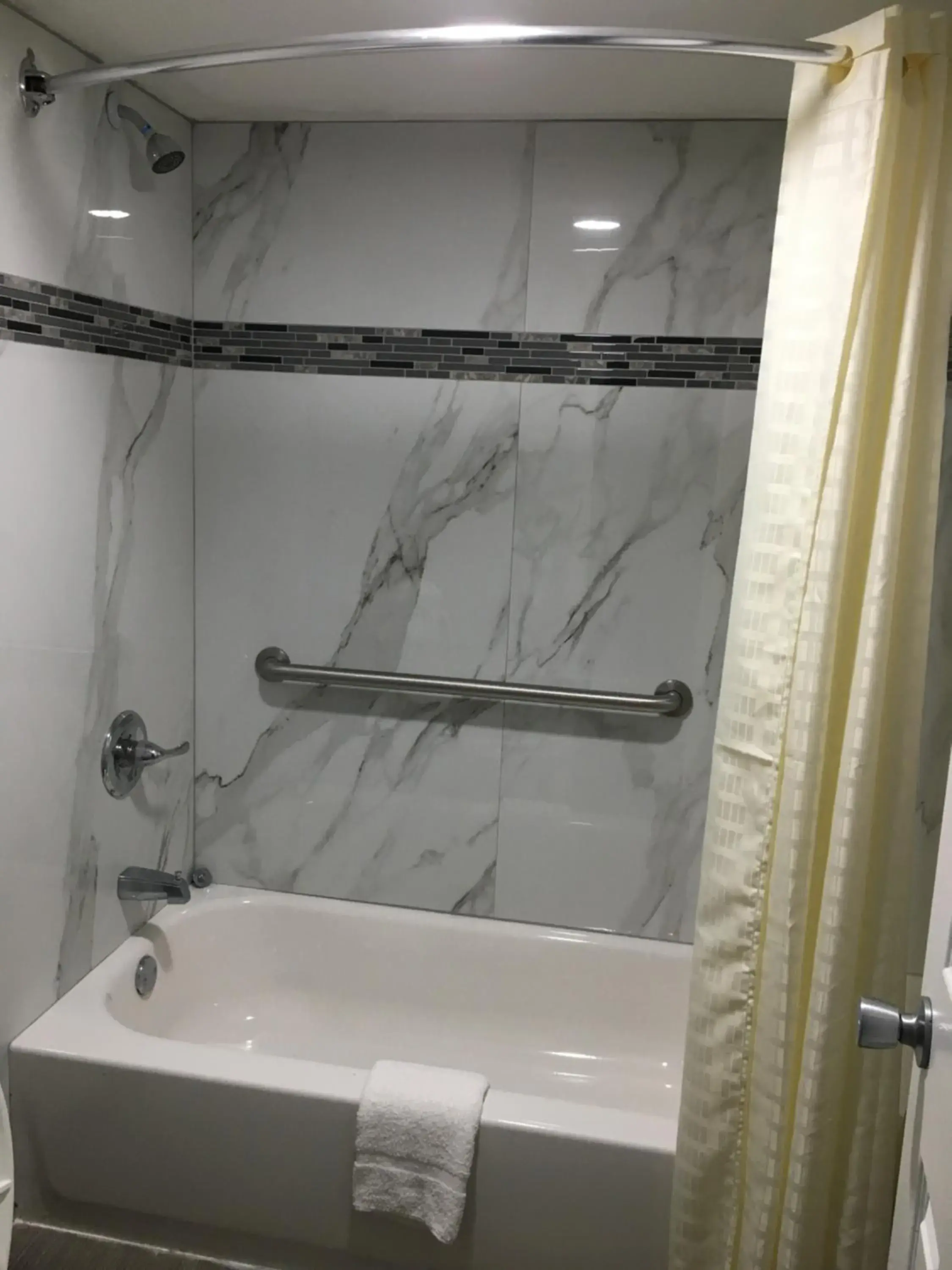 Bathroom in Travel Inn & Suites