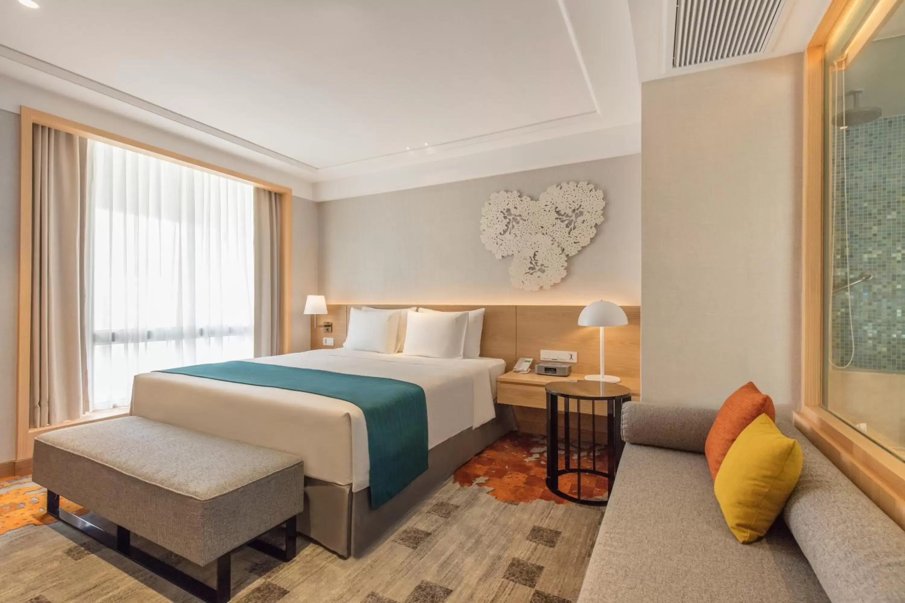 Bed in Holiday Inn Bangkok, an IHG Hotel