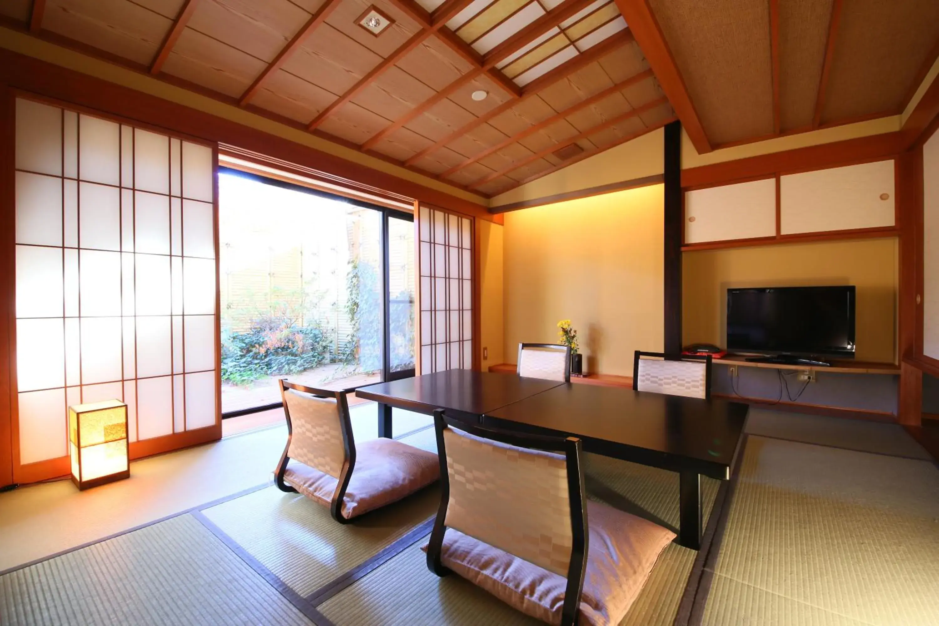 Photo of the whole room, Seating Area in Hotel Tamanoyu