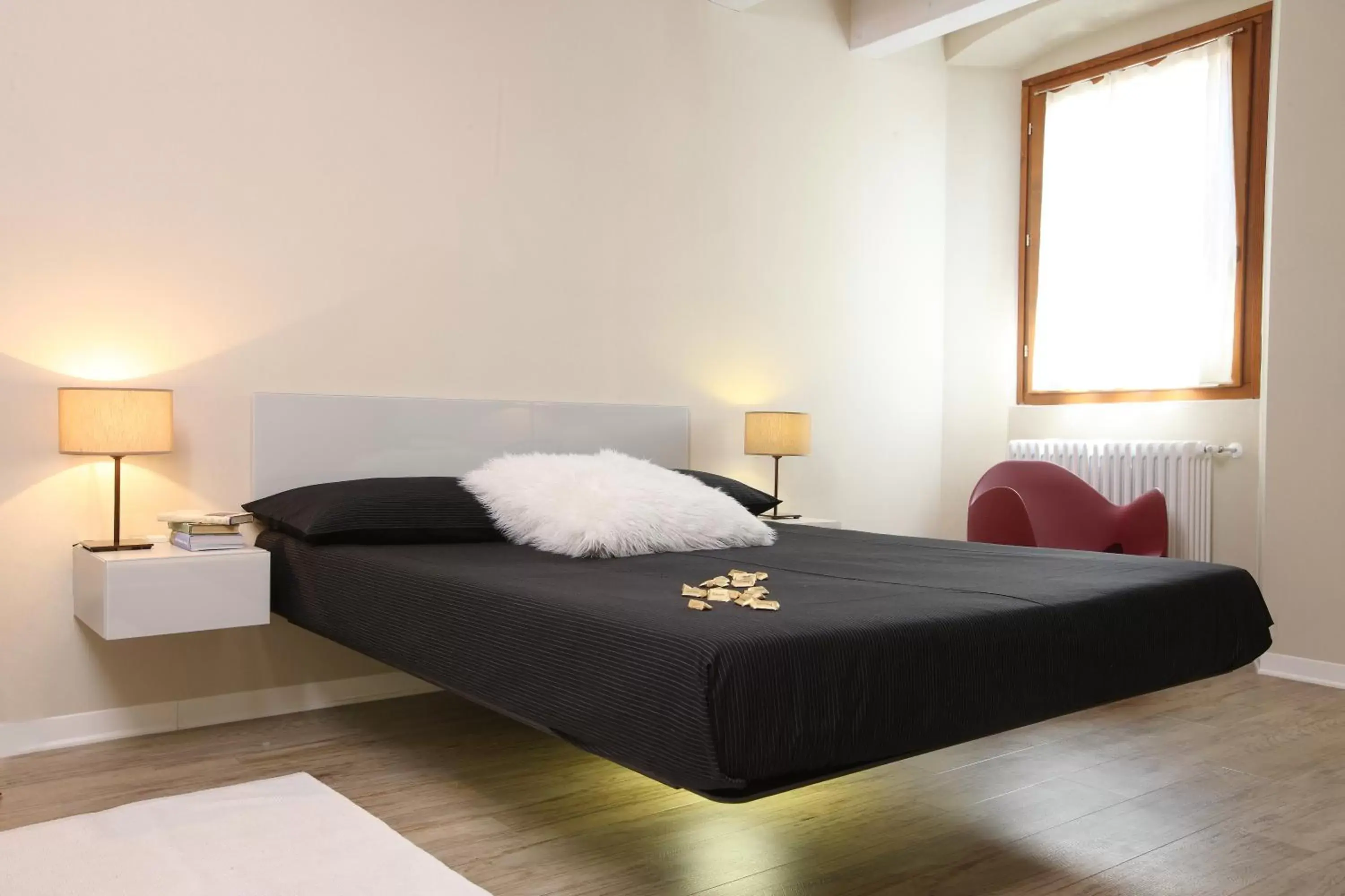 Bed in Corte San Luca Apartments