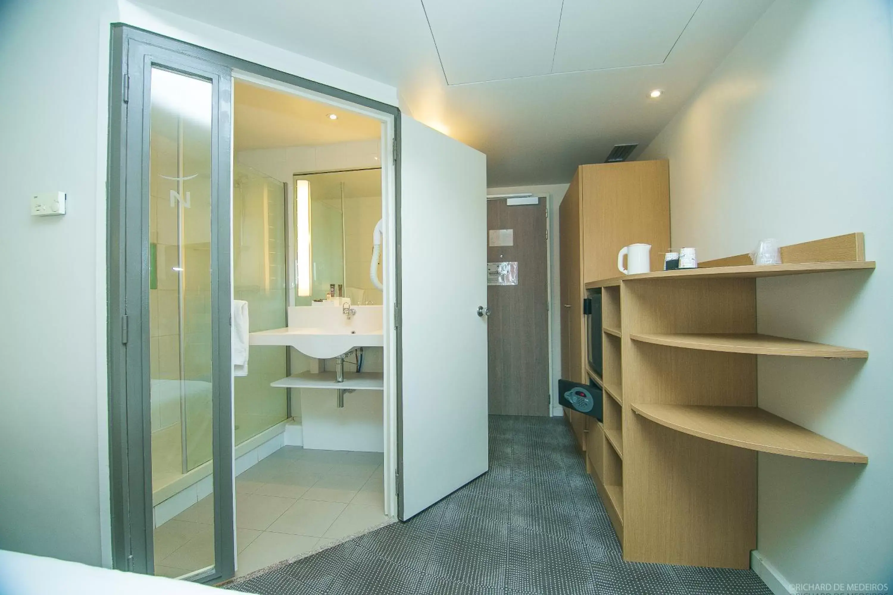 Shower, Bathroom in Novotel Dakar