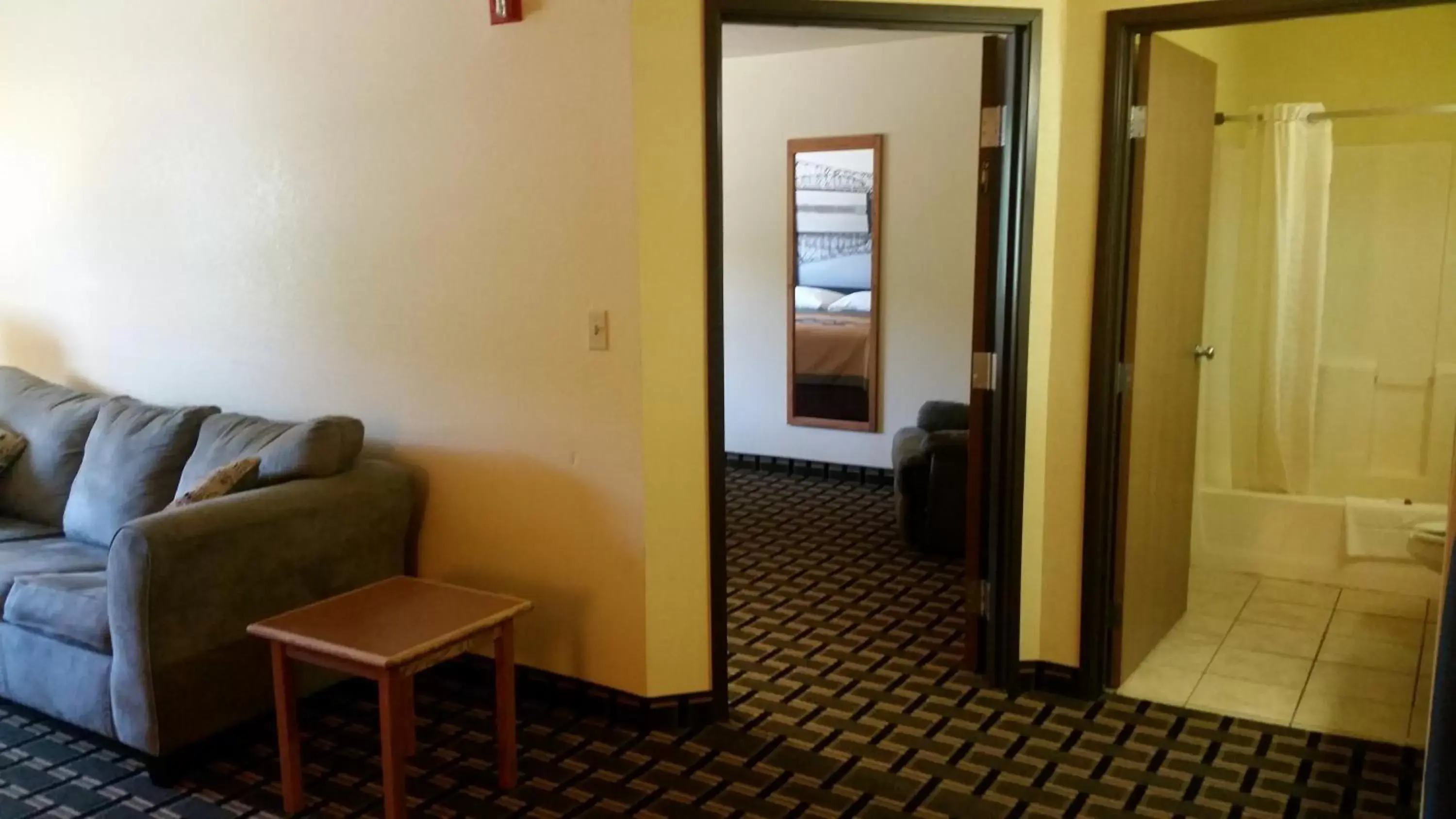 Photo of the whole room, Seating Area in Super 8 by Wyndham Wheeling St Clairsville OH Area