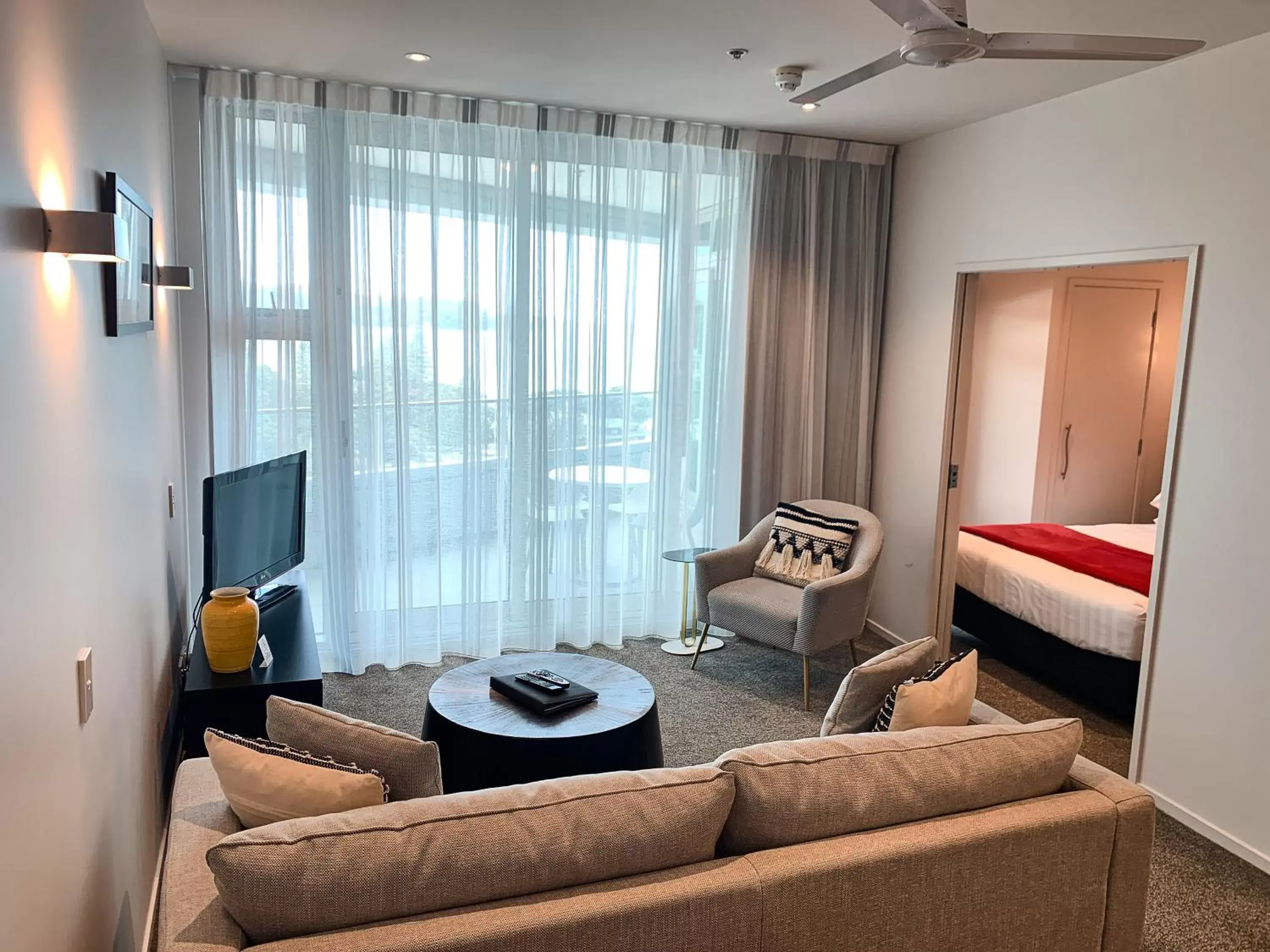 Living room in Ramada Suites by Wyndham Nautilus Orewa