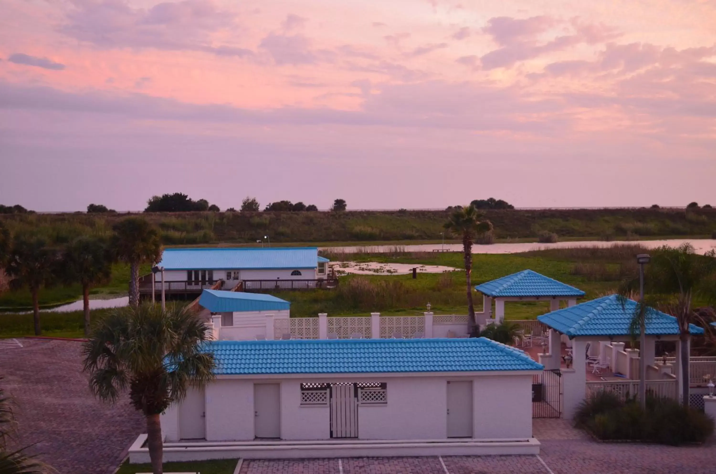 Natural landscape, Pool View in Days Inn & Suites by Wyndham Lake Okeechobee