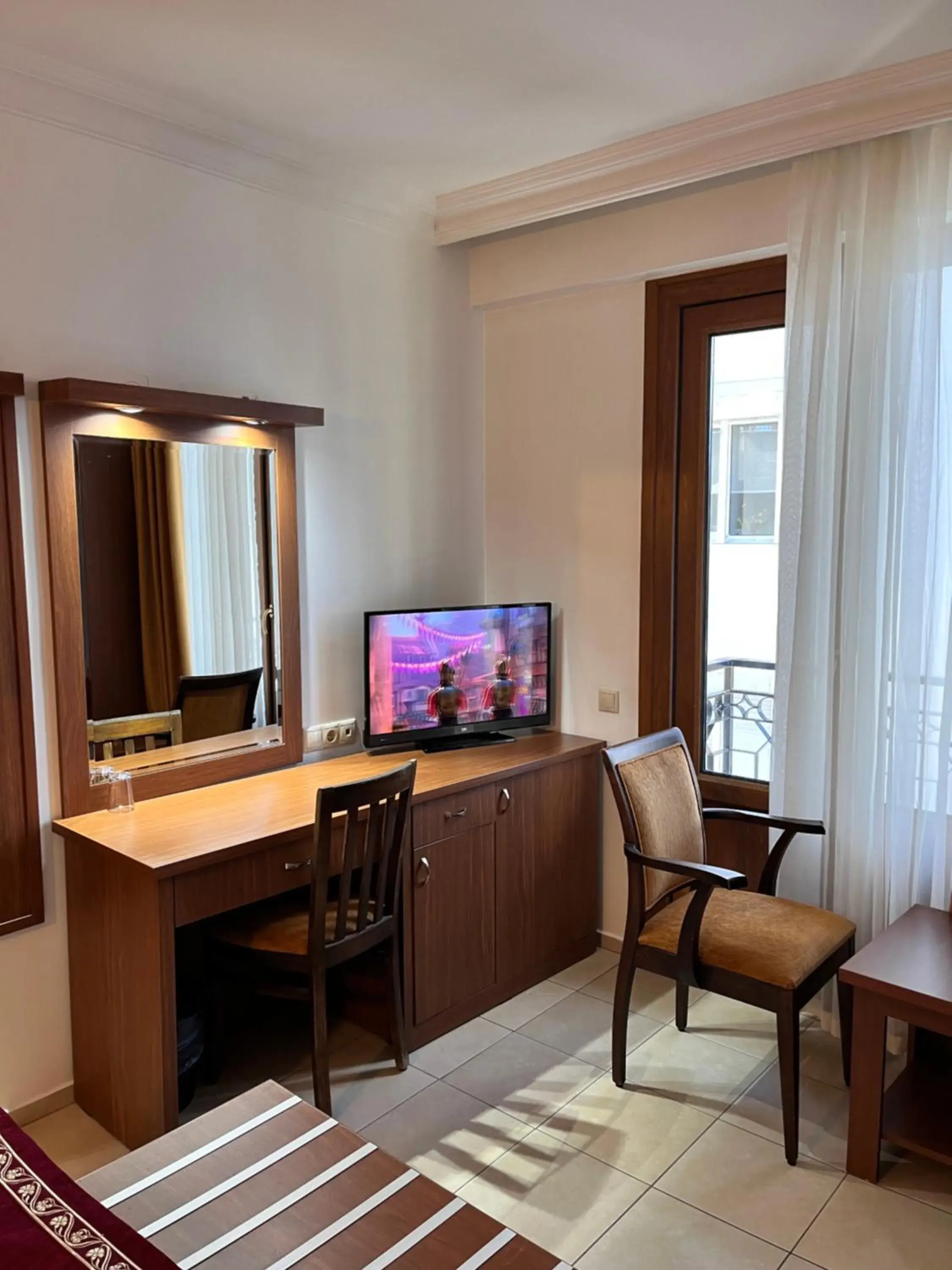 TV and multimedia, TV/Entertainment Center in Hotel Royal Hill