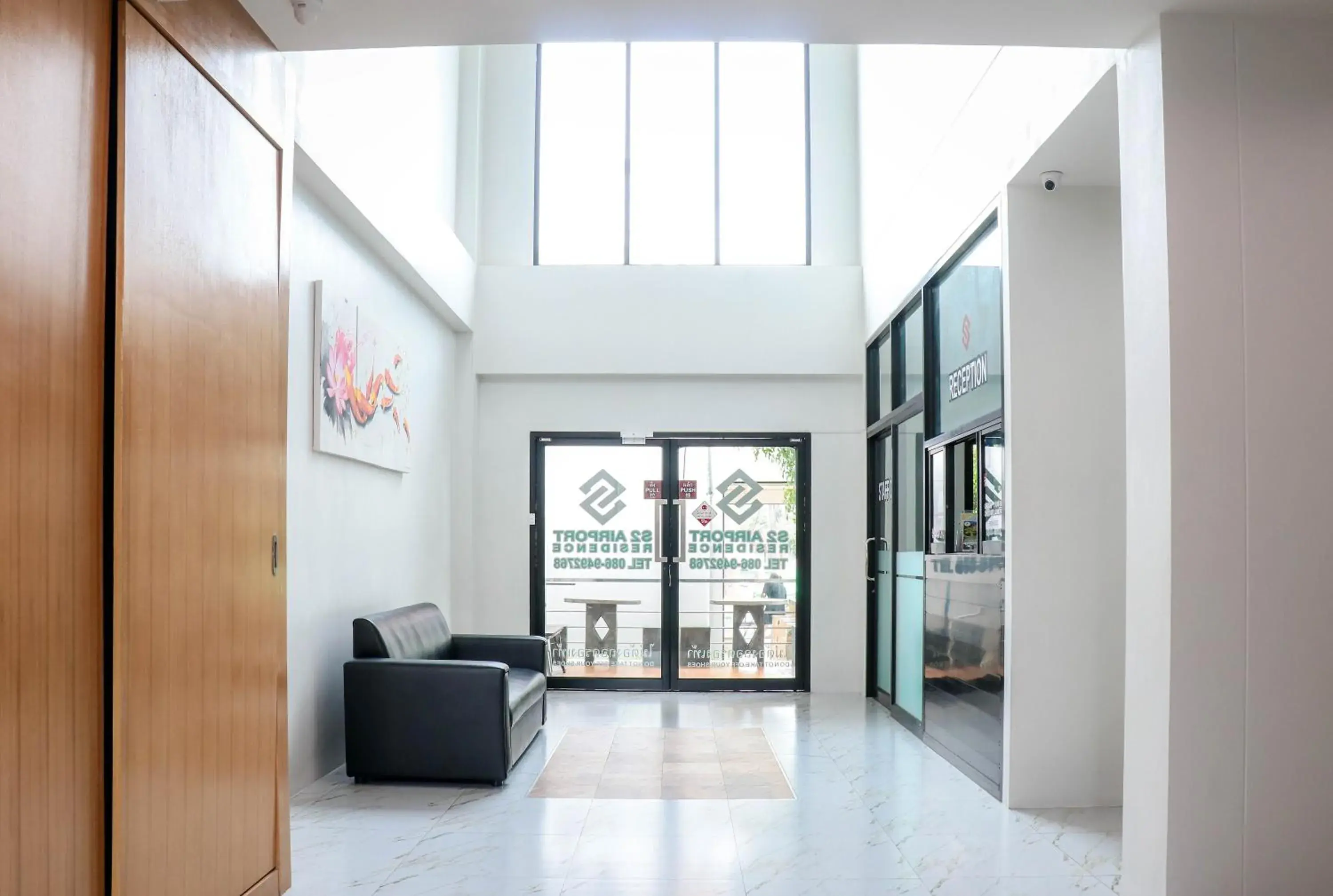 Lobby or reception in S2 Airport Residence Lobby or reception in S2 Airport Residence