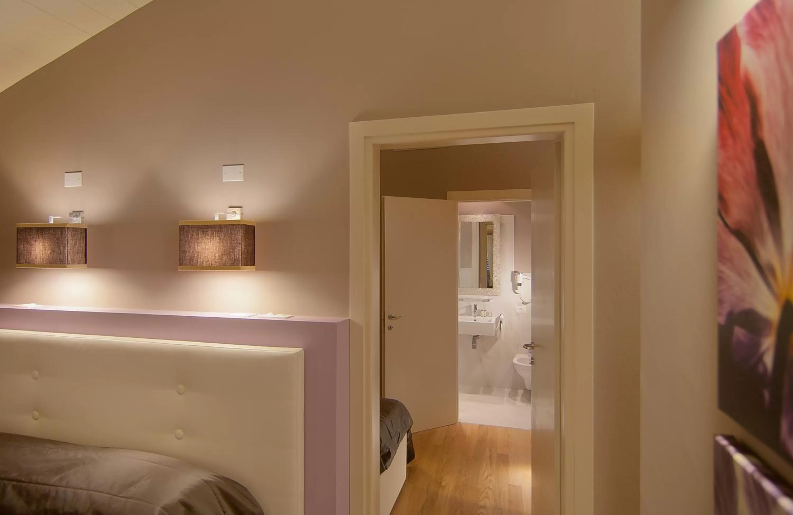 Bed in Hotel Arnolfo & Aqua Laetitia Spa & Beauty