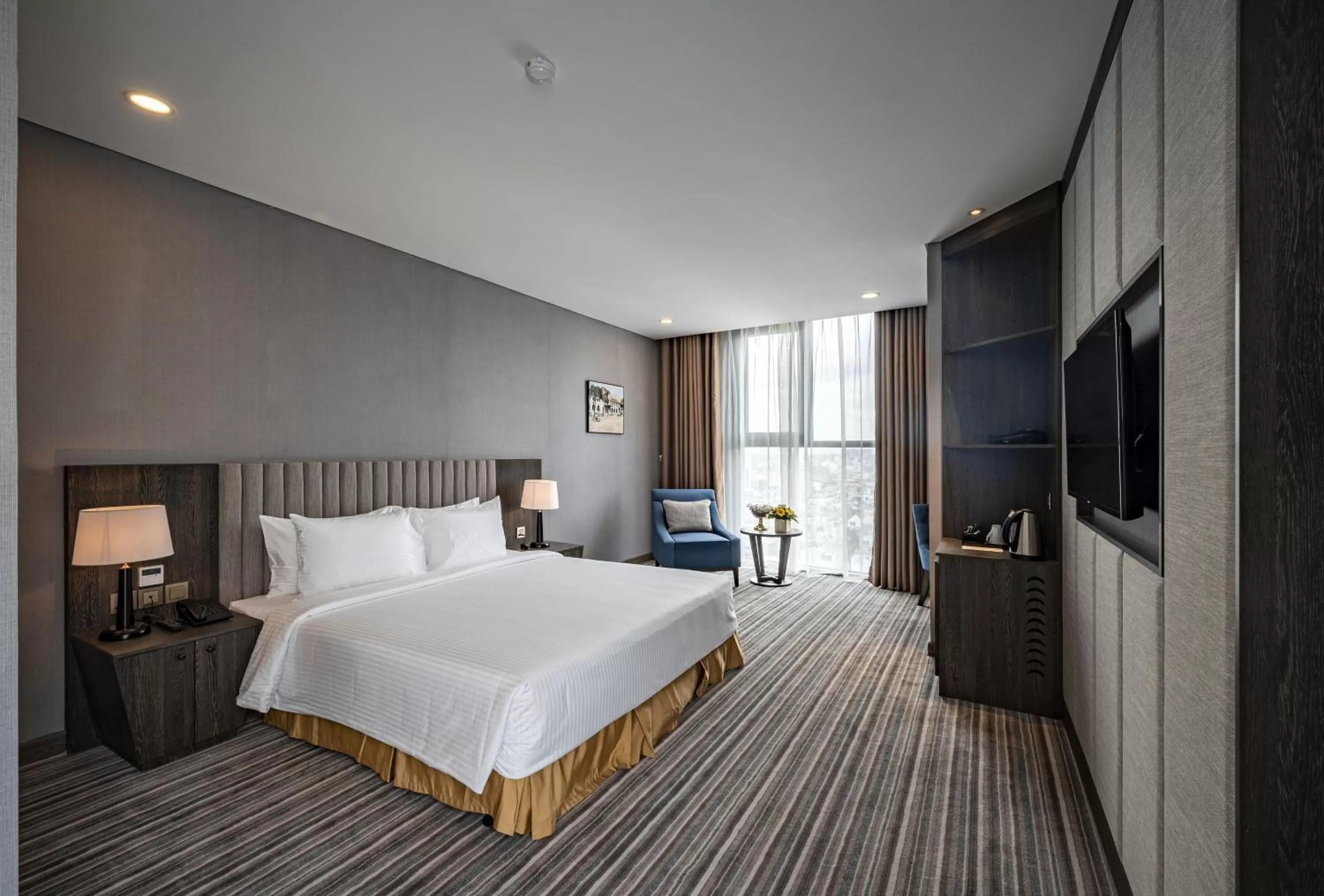 Photo of the whole room, Bed in Muong Thanh Luxury Saigon Hotel