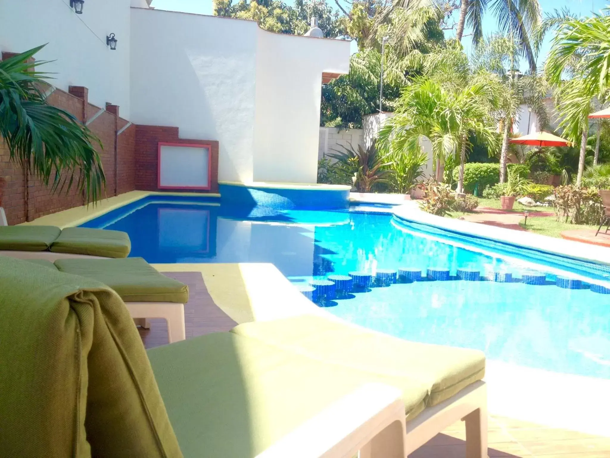 Swimming Pool in Hotel y Suites Los Encantos