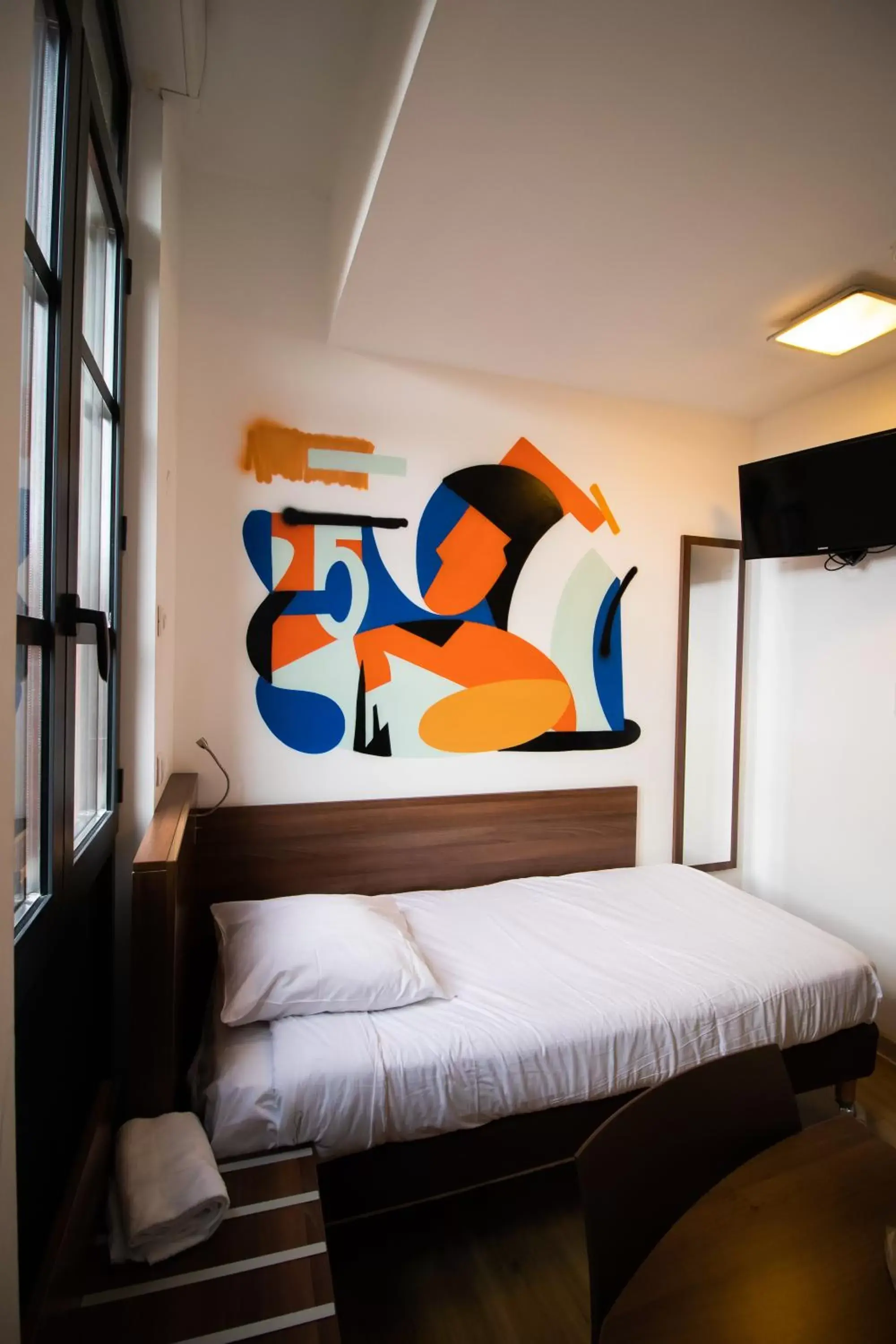 Photo of the whole room, Bed in Hôtel le Pastel