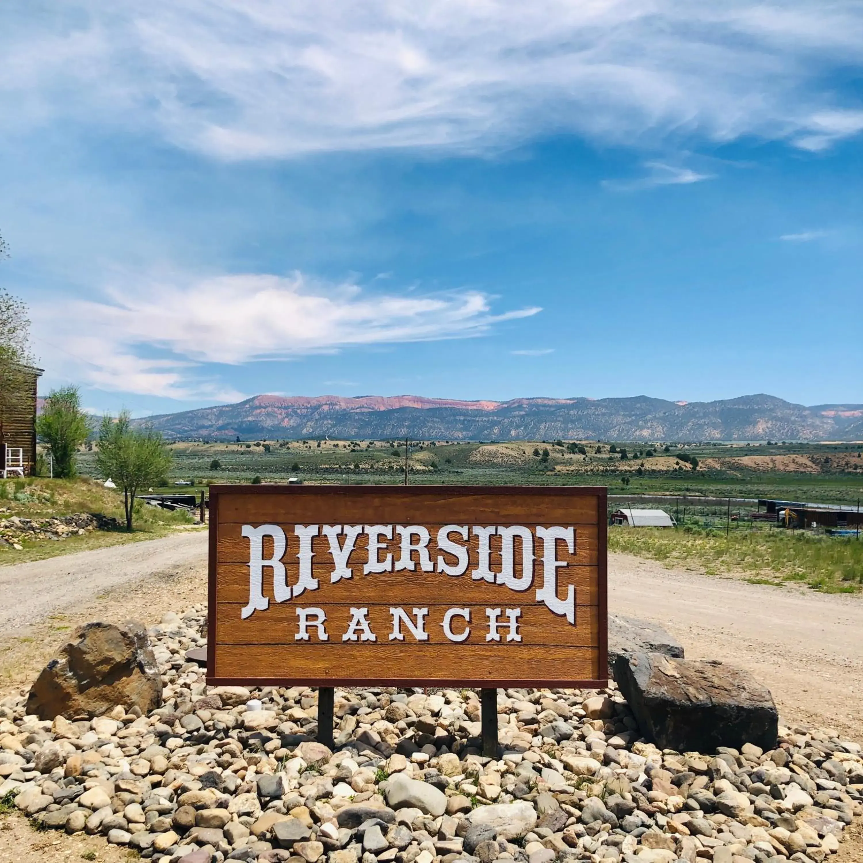 Property logo or sign in The Riverside Ranch Motel and RV Park