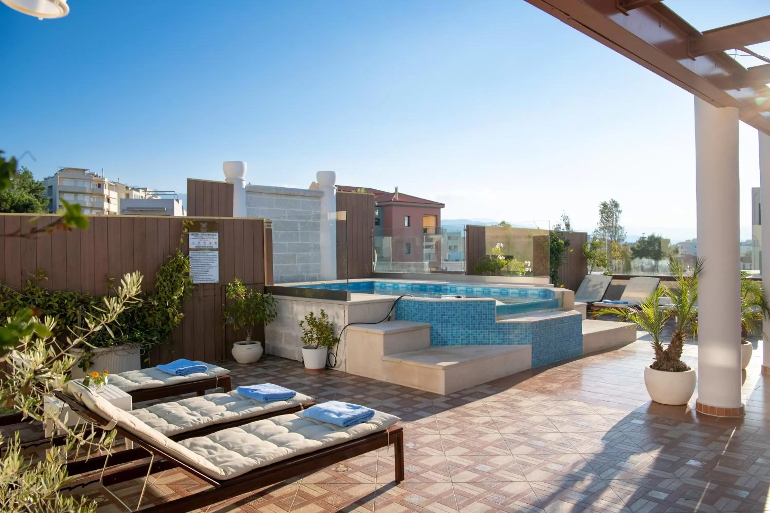 Patio, Swimming Pool in Halepa Hotel