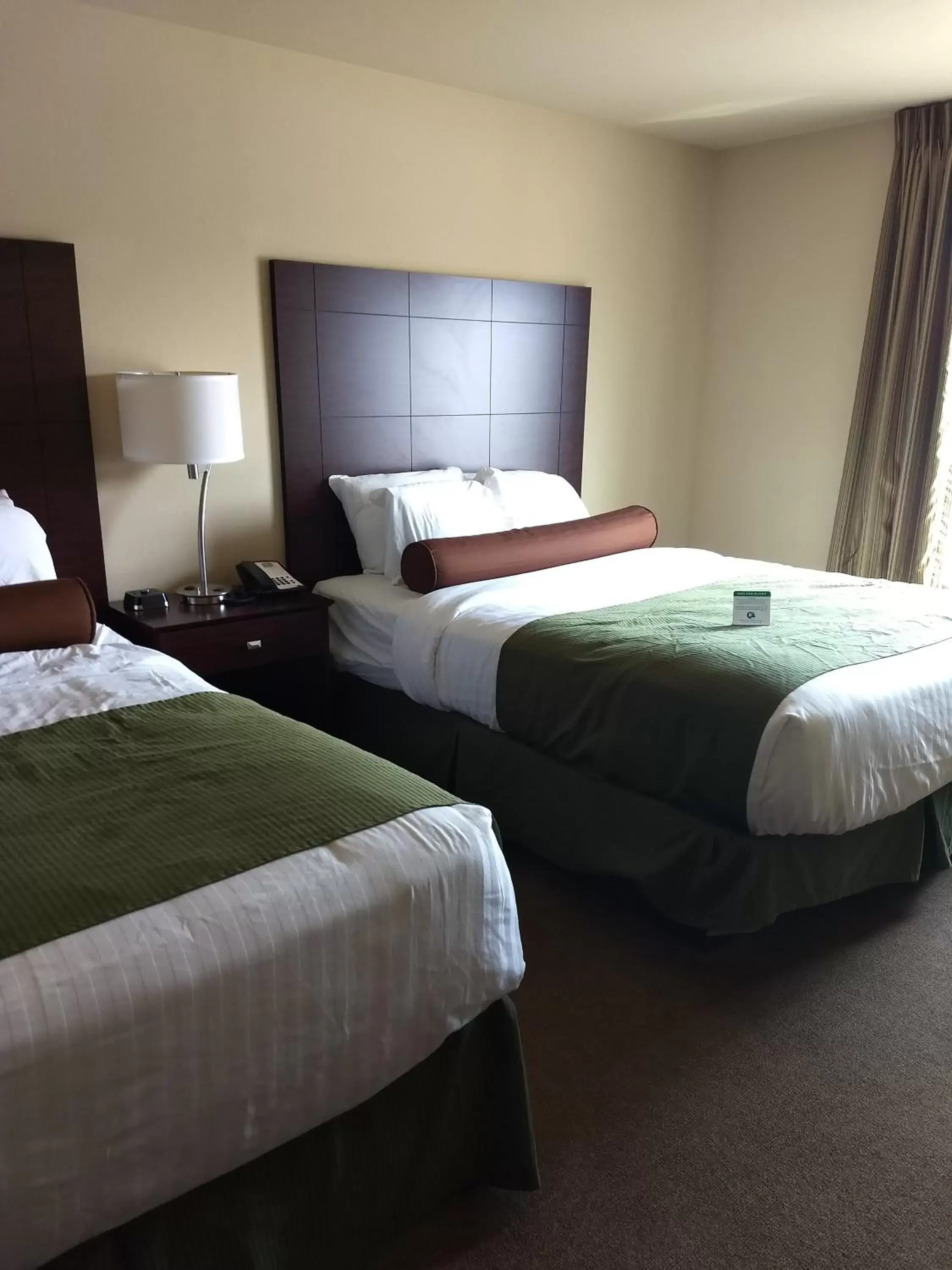 Bed in Cobblestone Hotel and Suites - Crookston