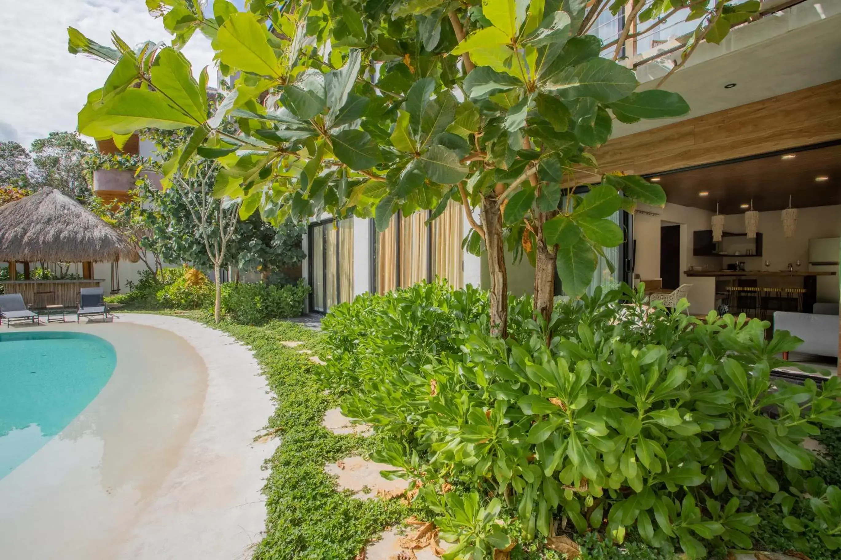 Photo of the whole room, Swimming Pool in Luxury Condos Macondo Tulum