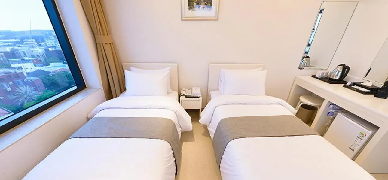 Bed in Rezion Hotel