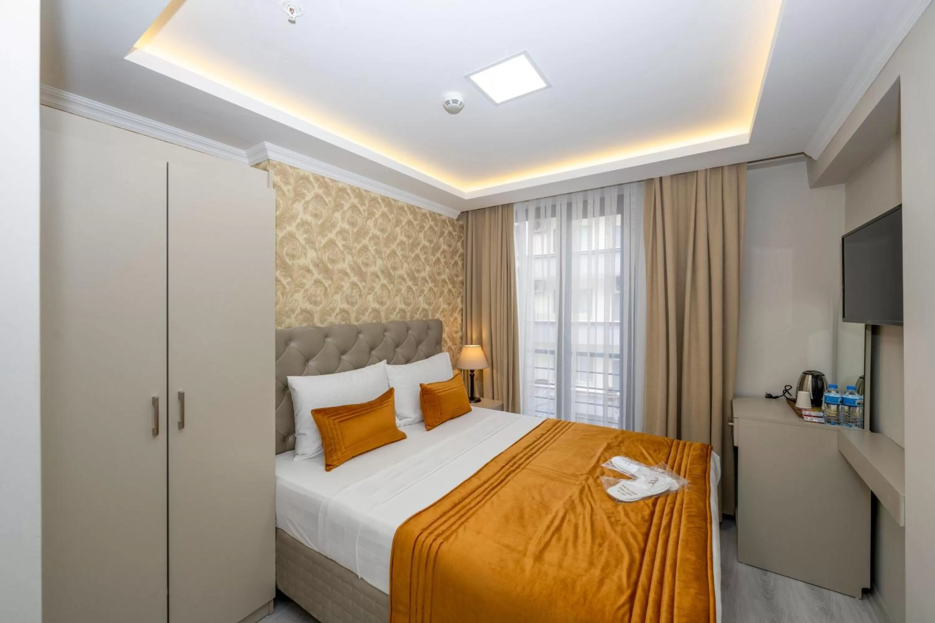 Bed in SKYSTAR DELUXE HOTEL