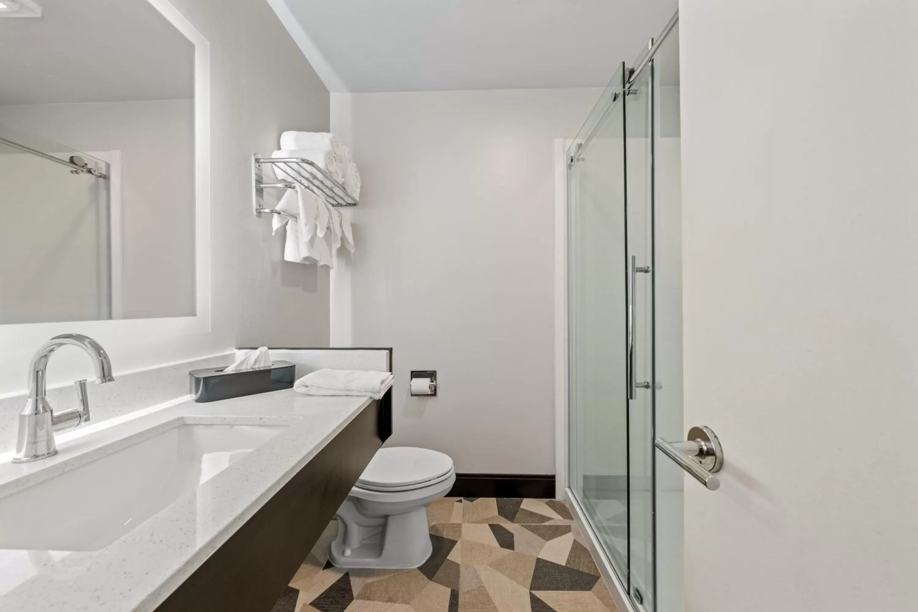Bathroom in SureStay Hotel by Best Western Virginia Beach Royal Clipper